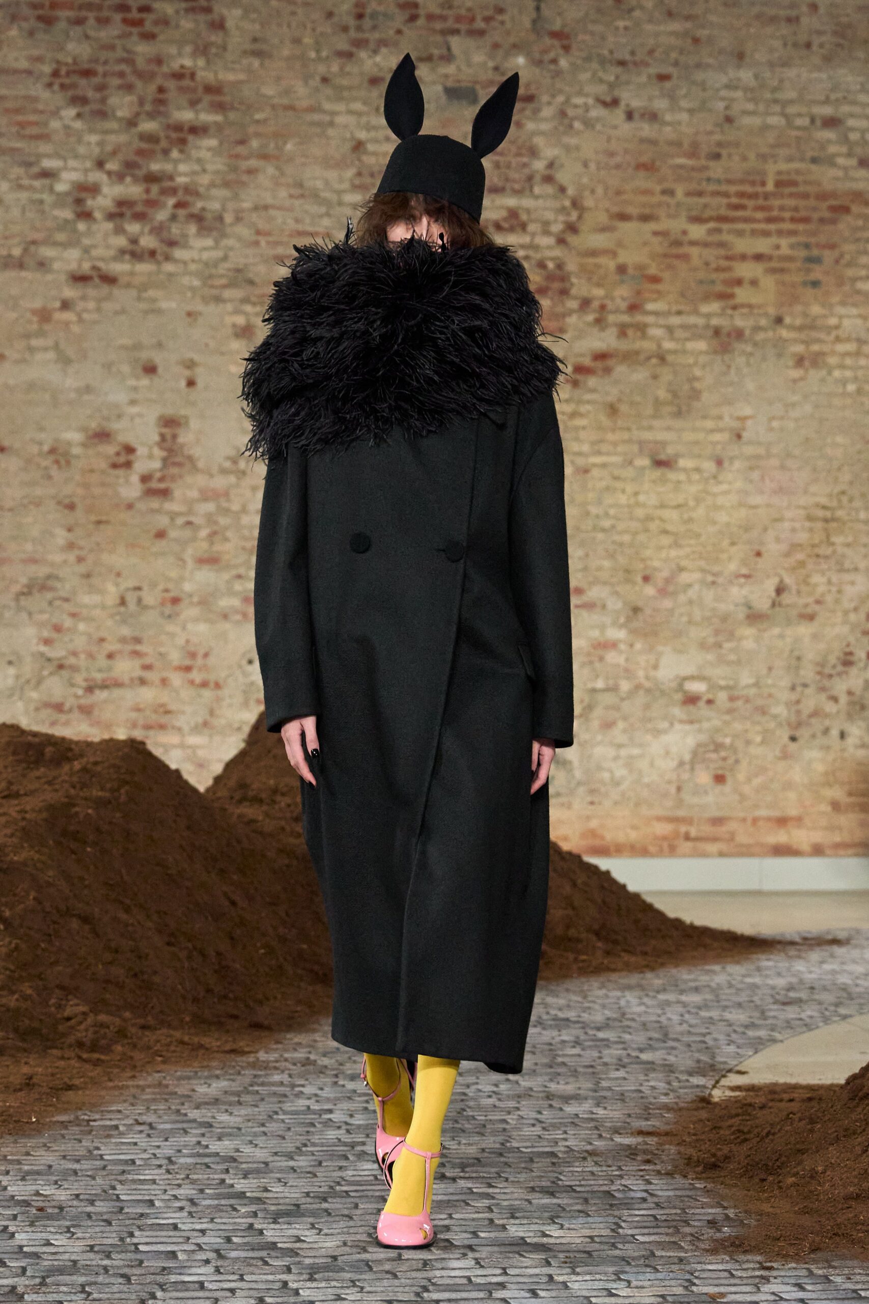 black wool relaxed coat with fringed collar