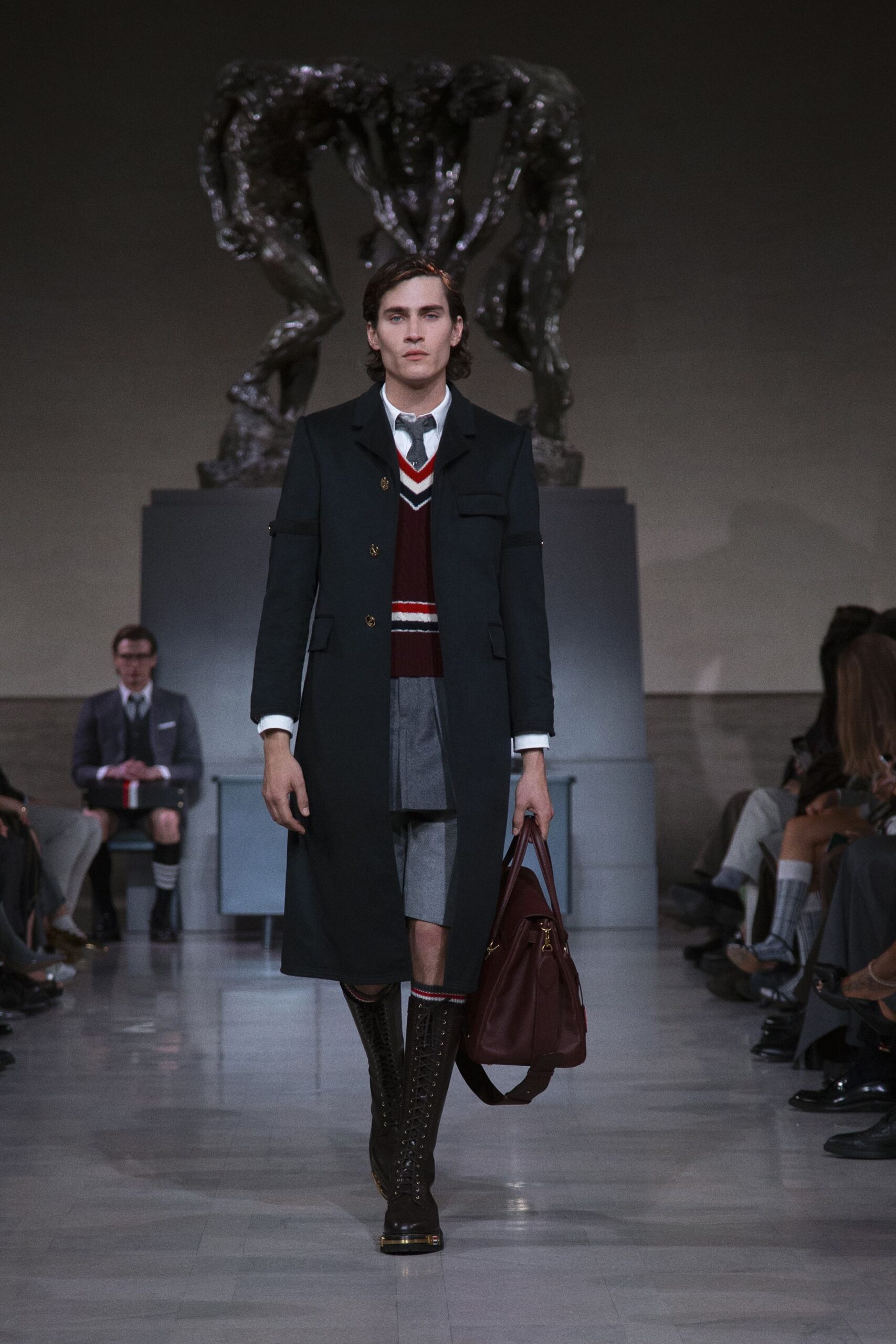 black wool long-sleeve collared structured buttoned coat