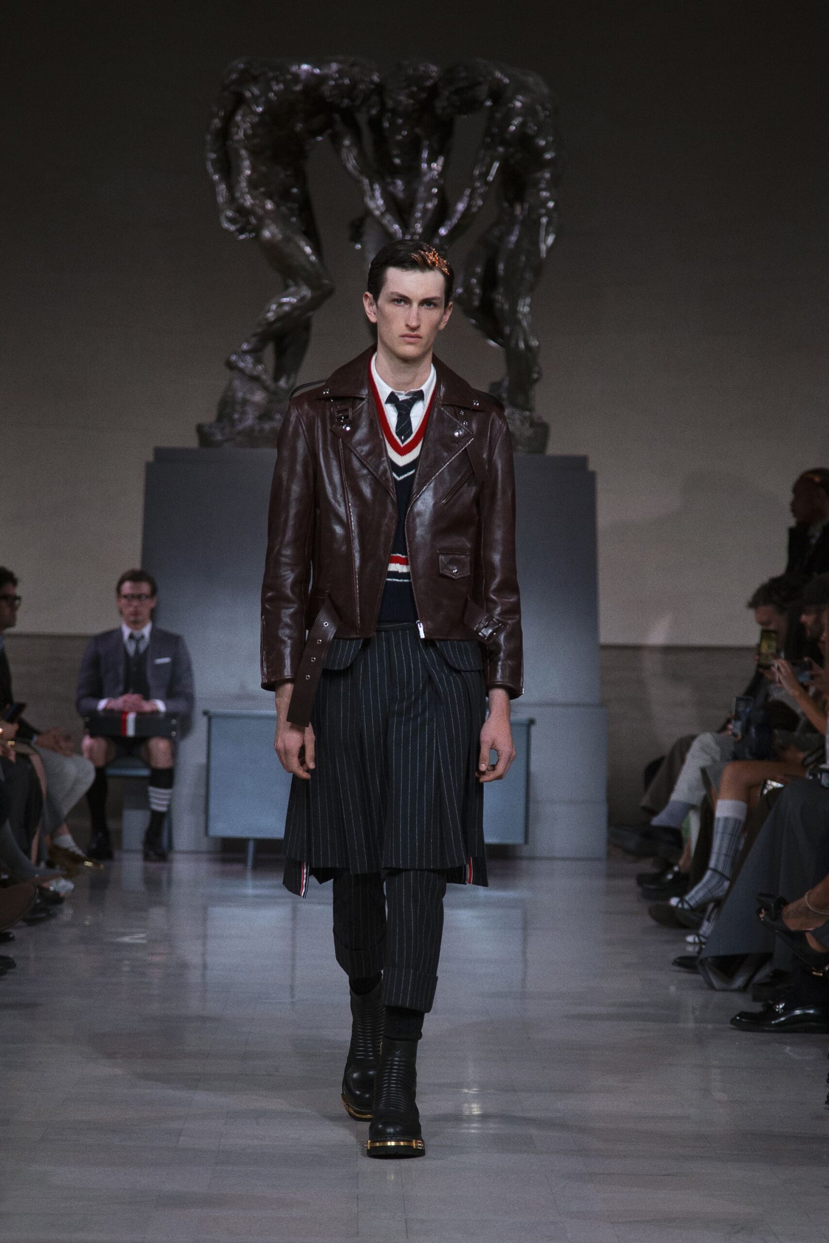 brown leather jacket with striped pants