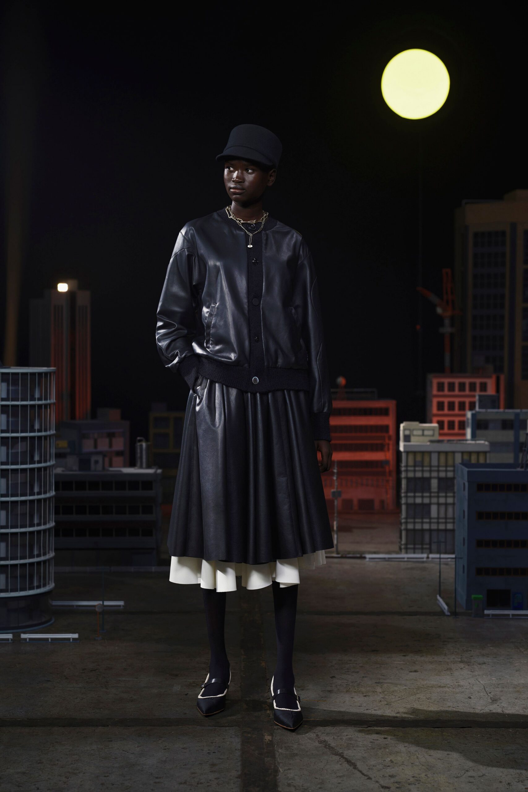 black leather fitted pleated midi skirt