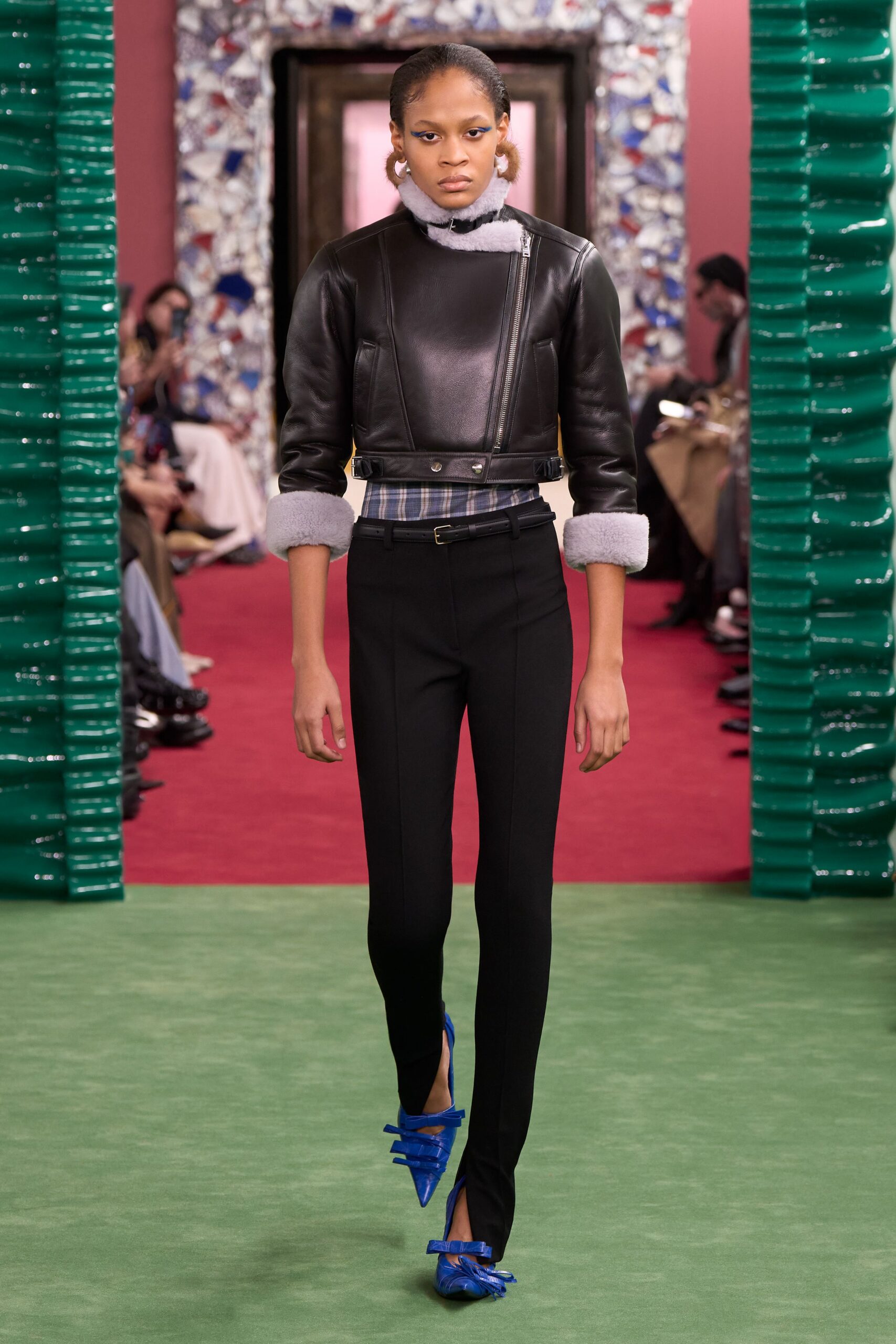 black leather fitted jacket with blue shoes