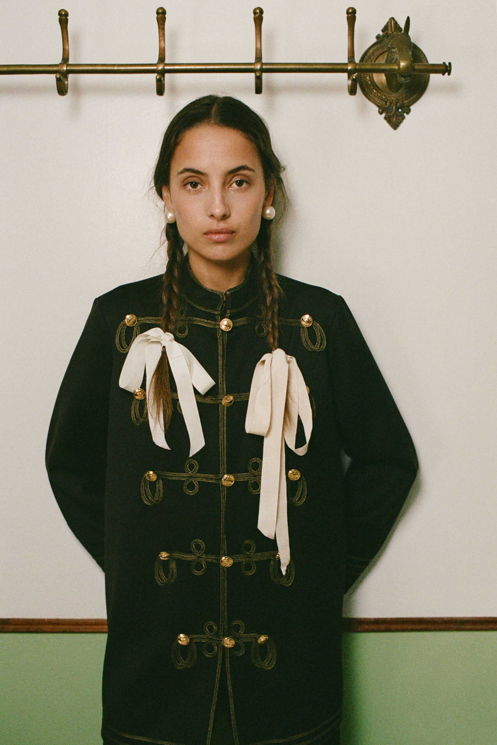 black fitted coat with embroidery