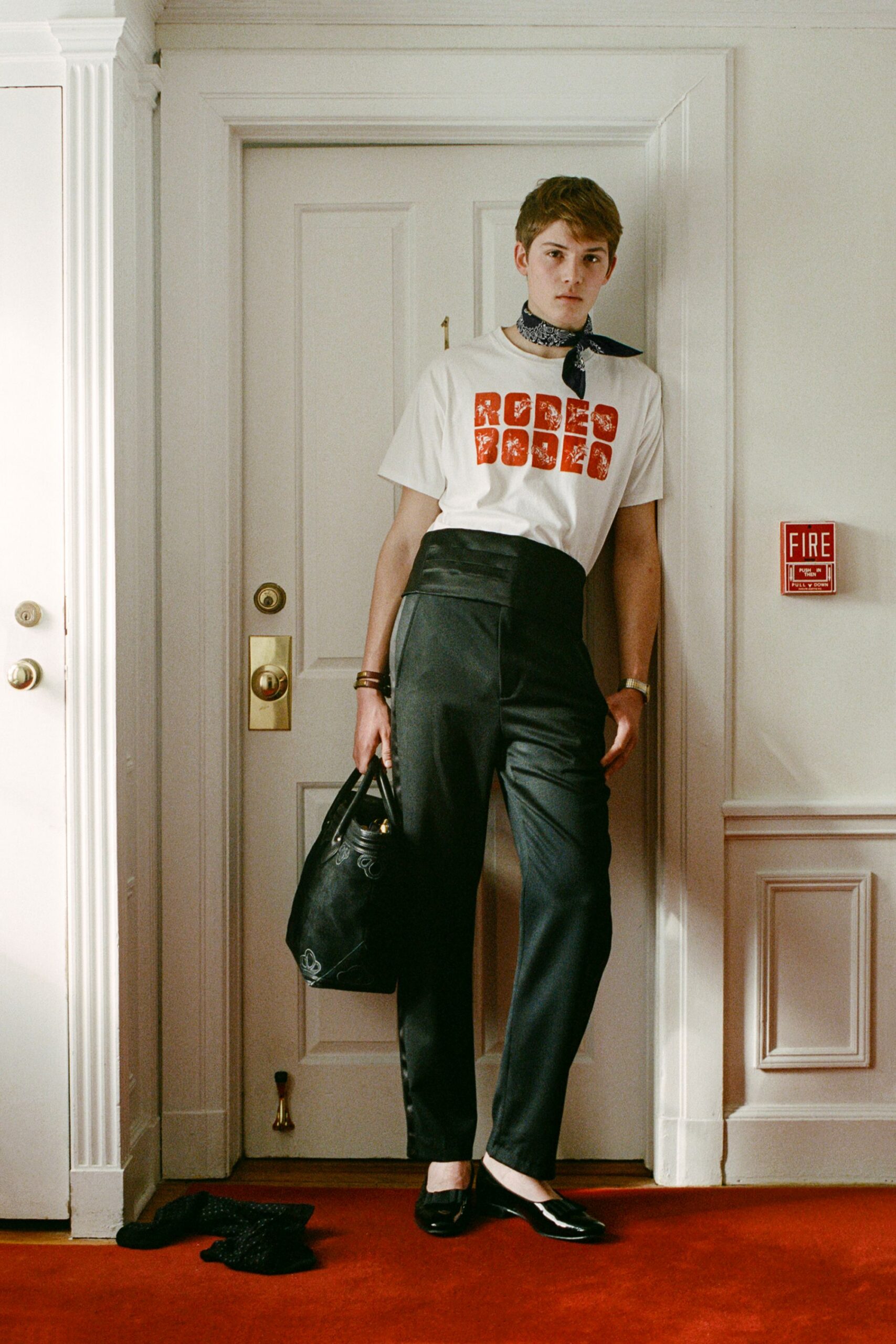 white printed t-shirt with black pants