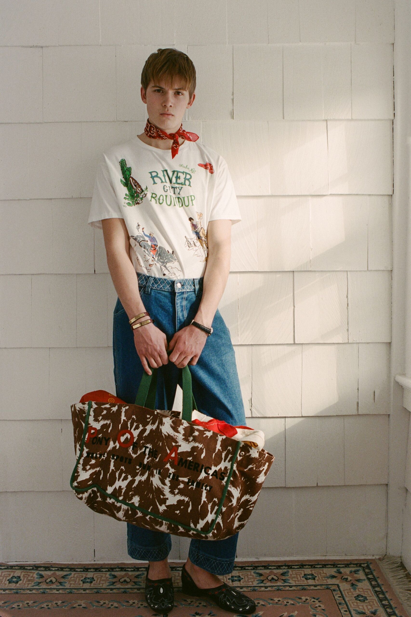 white printed t-shirt with blue jeans