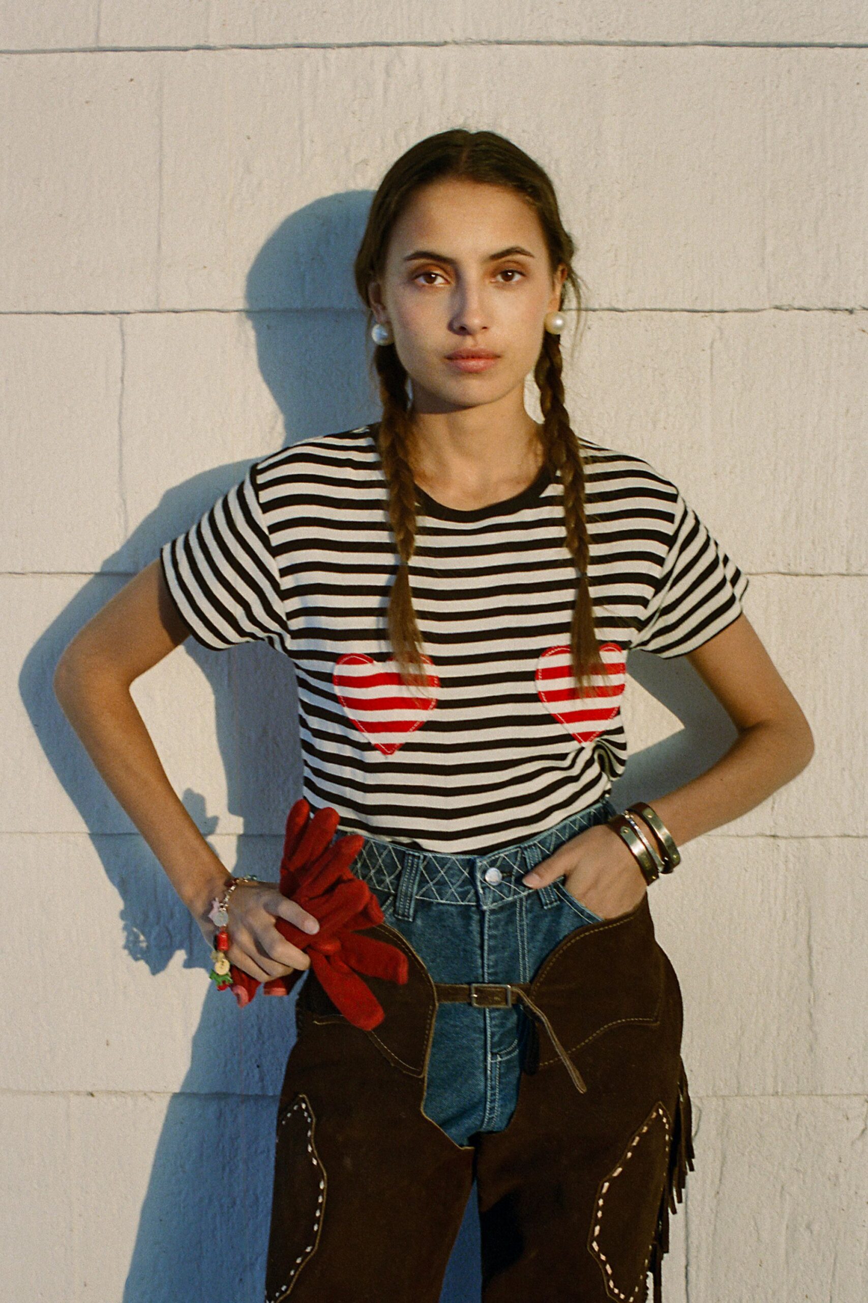 striped t-shirt with distressed pants