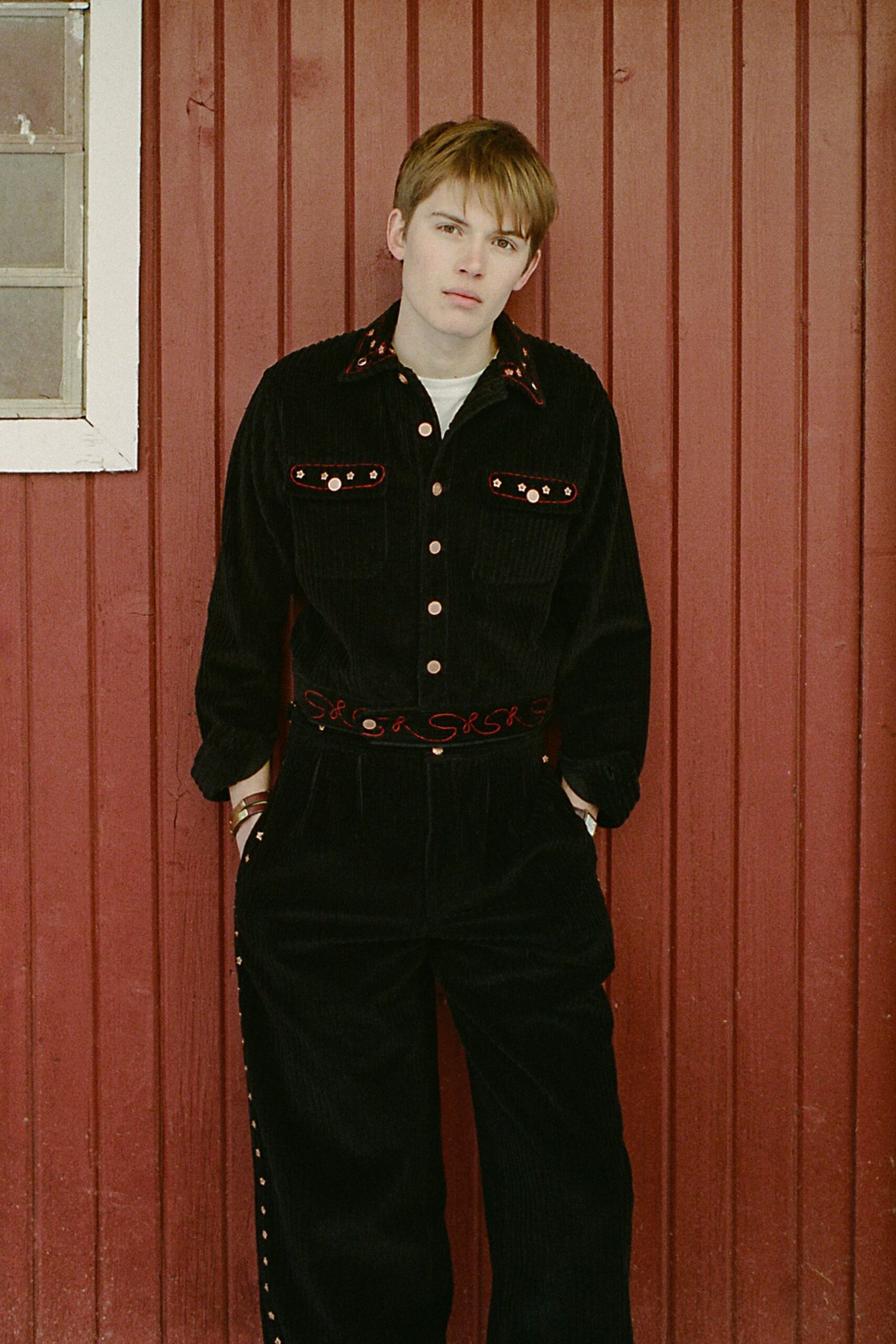 black cotton long-sleeve collared relaxed buttoned jacket