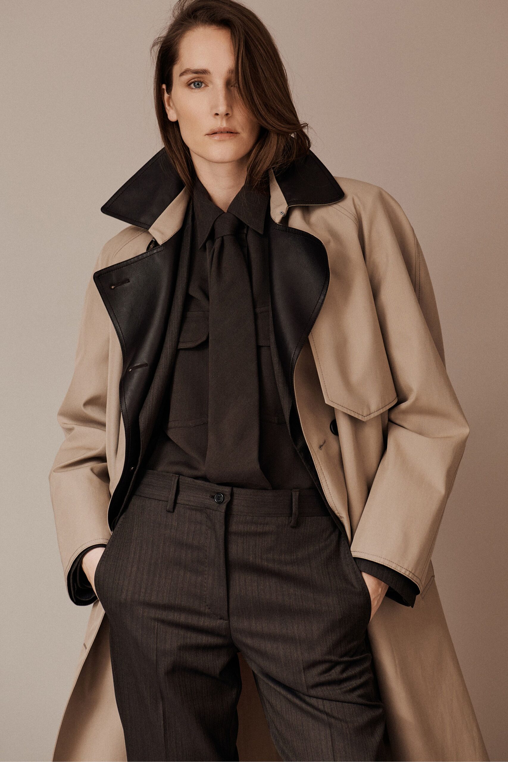 beige cotton long-sleeve collared relaxed buttoned trench