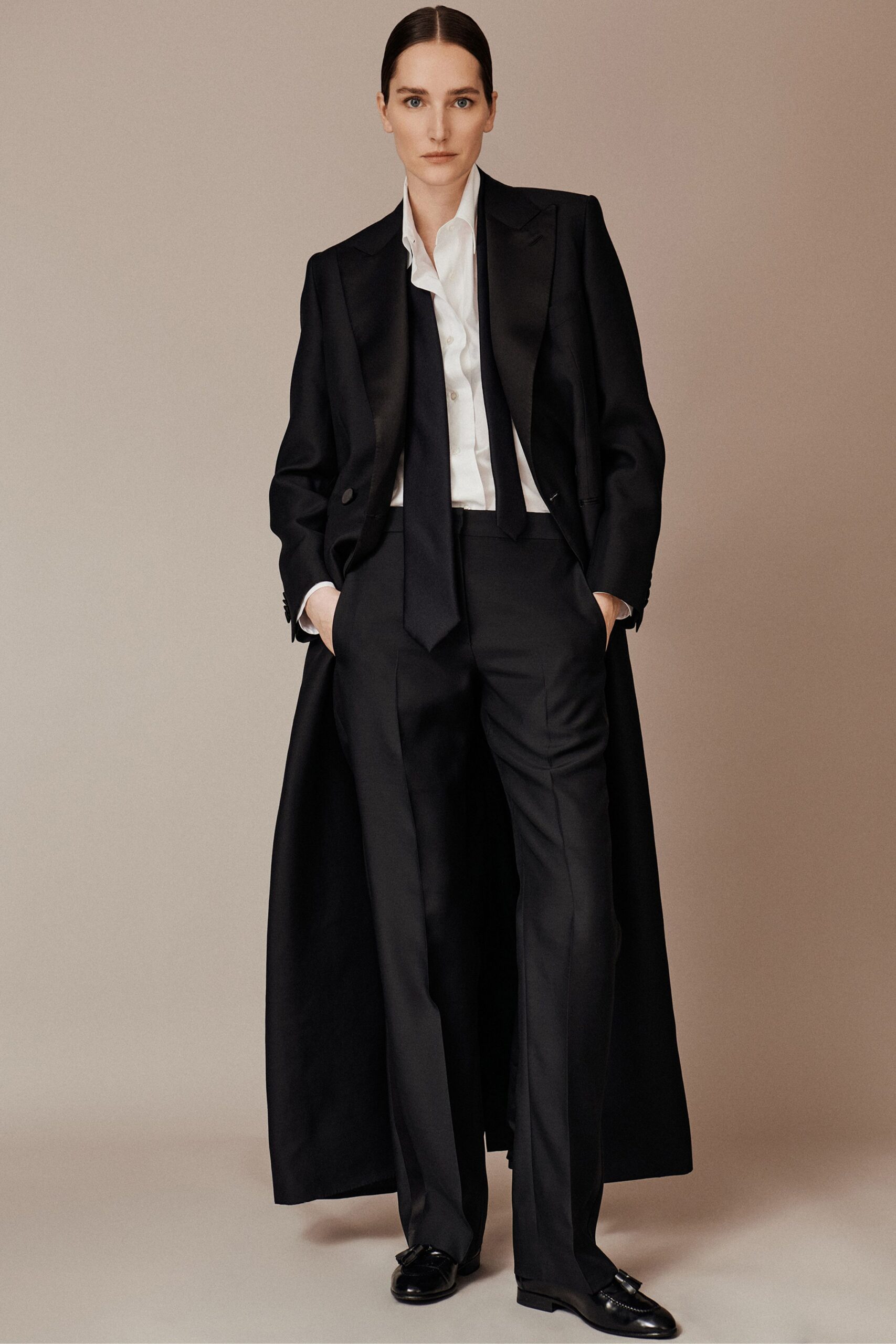 black wool long-sleeve collared tailored buttoned maxi coat