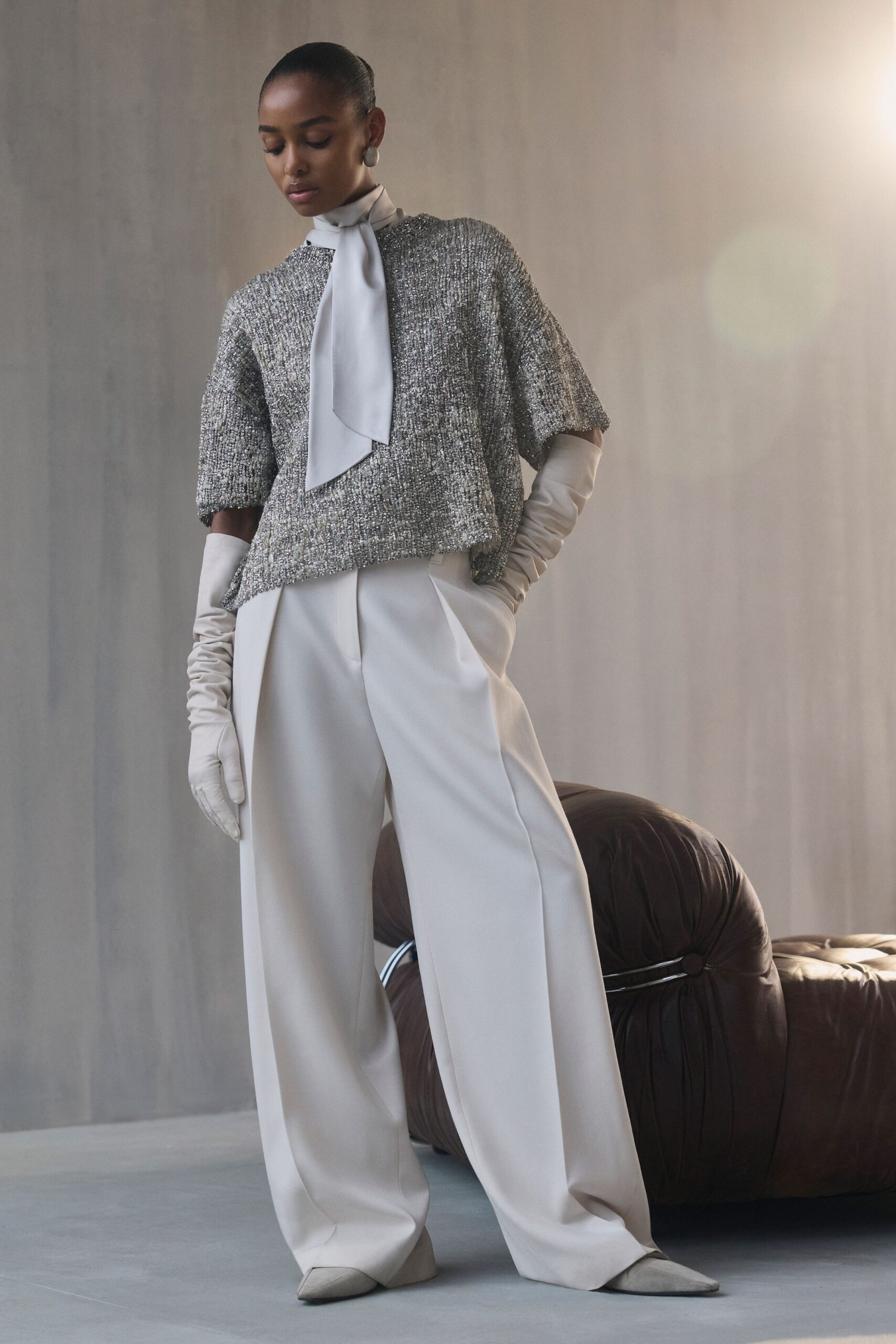 gray tweed top with white pants