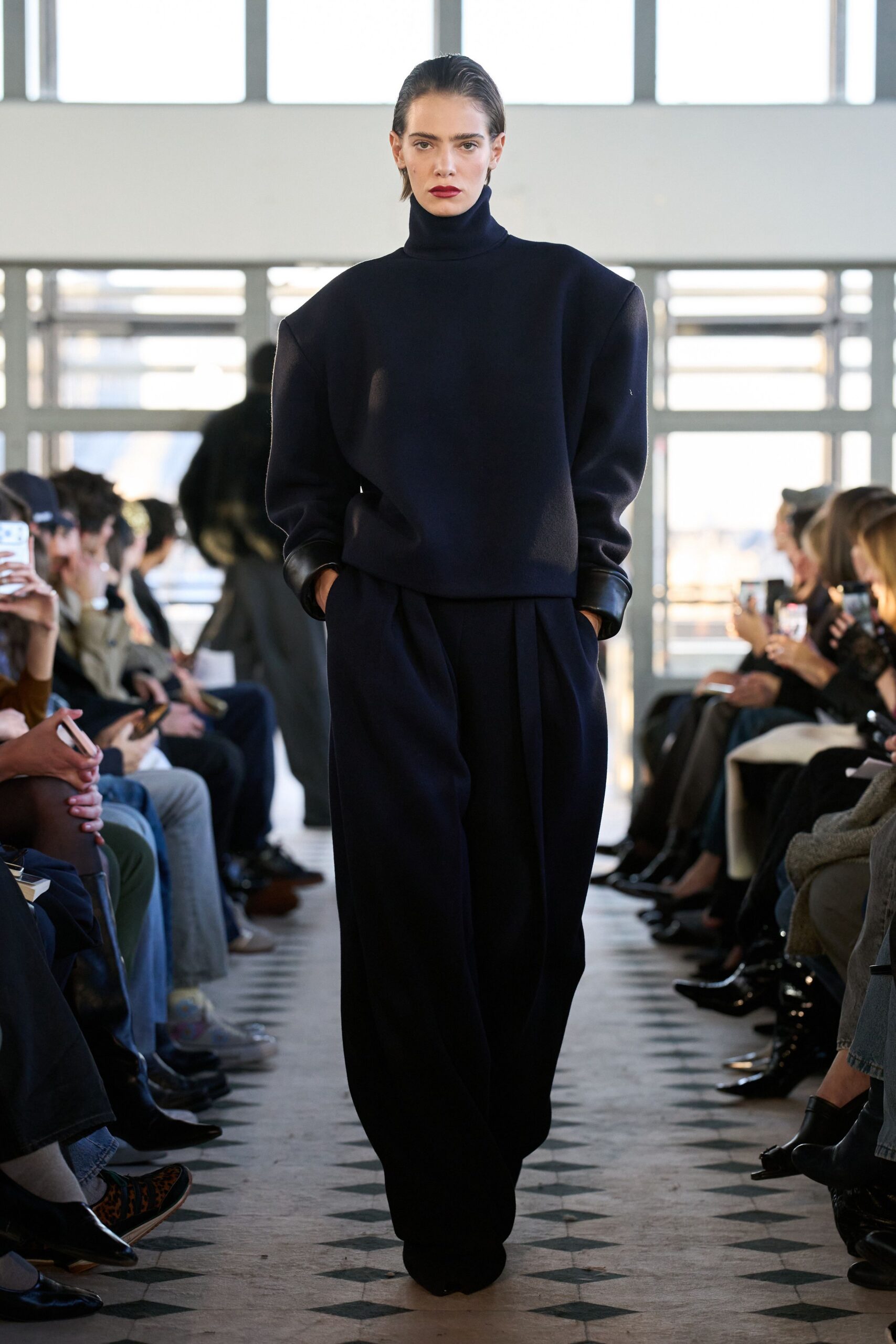 oversized black sweater and relaxed pants