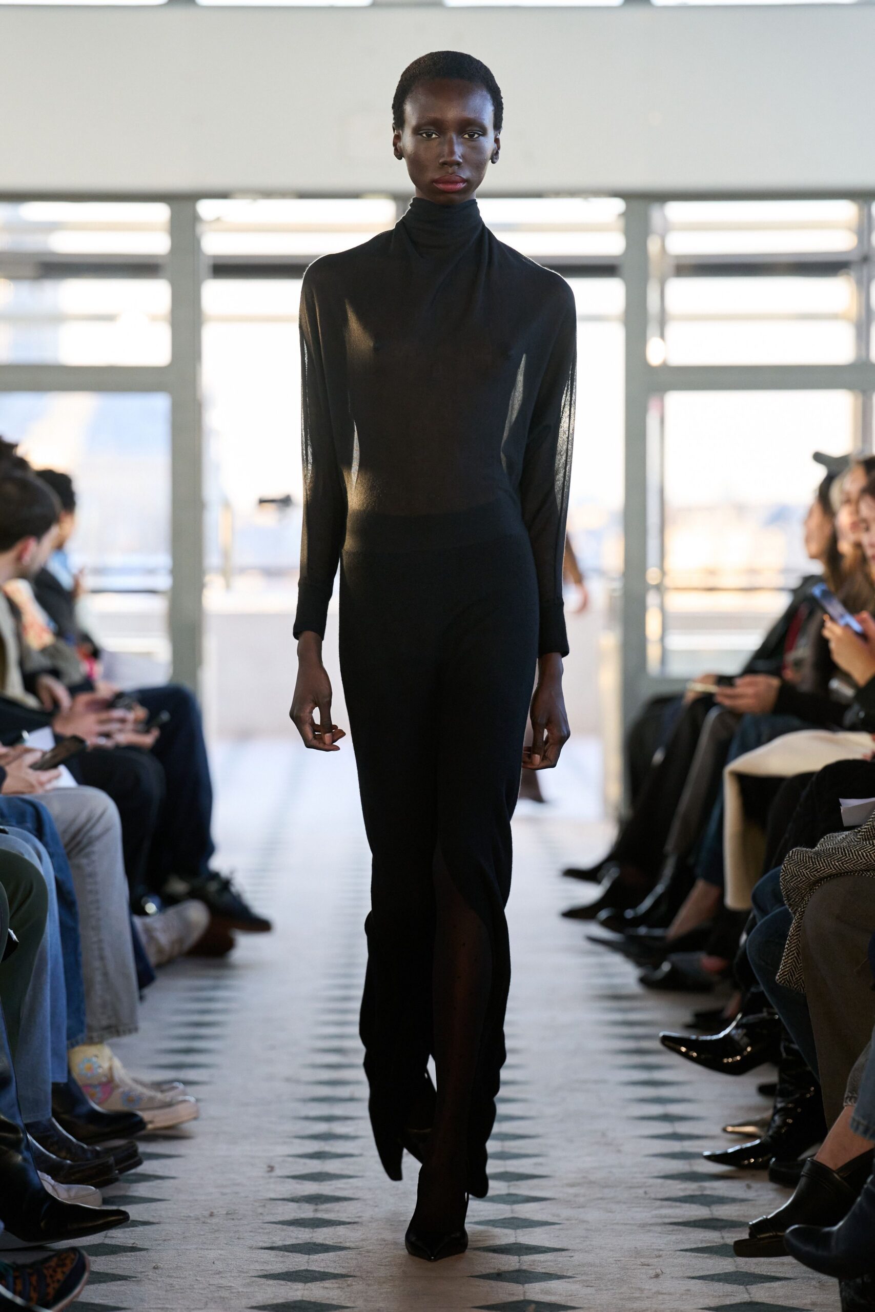 black fitted bodysuit and pants