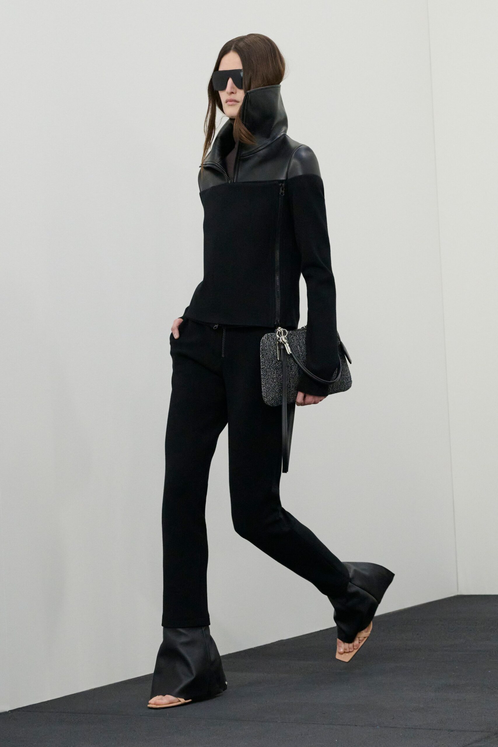 black cotton long-sleeve collared fitted zippered top