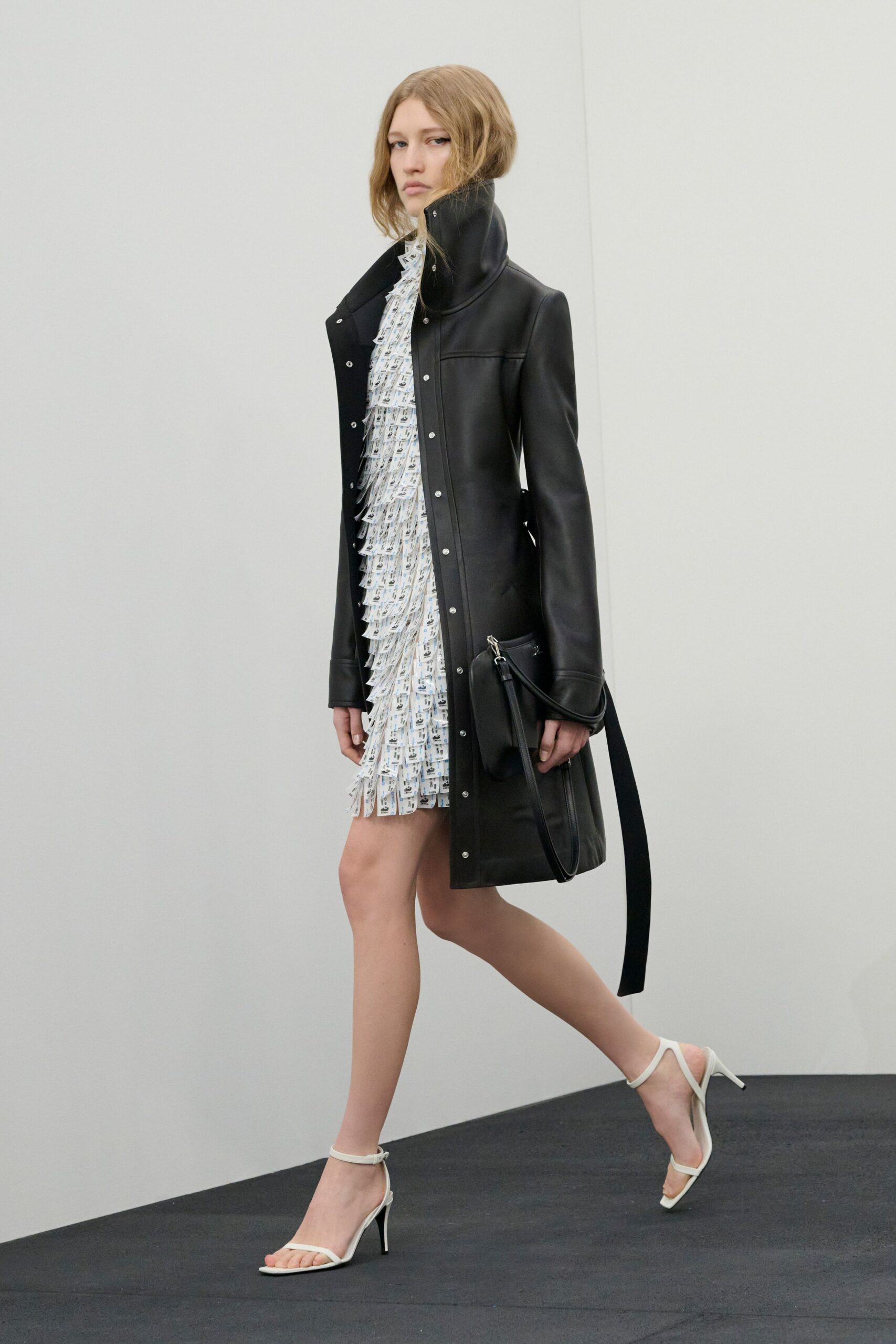 black leather long-sleeve collared fitted zippered coat