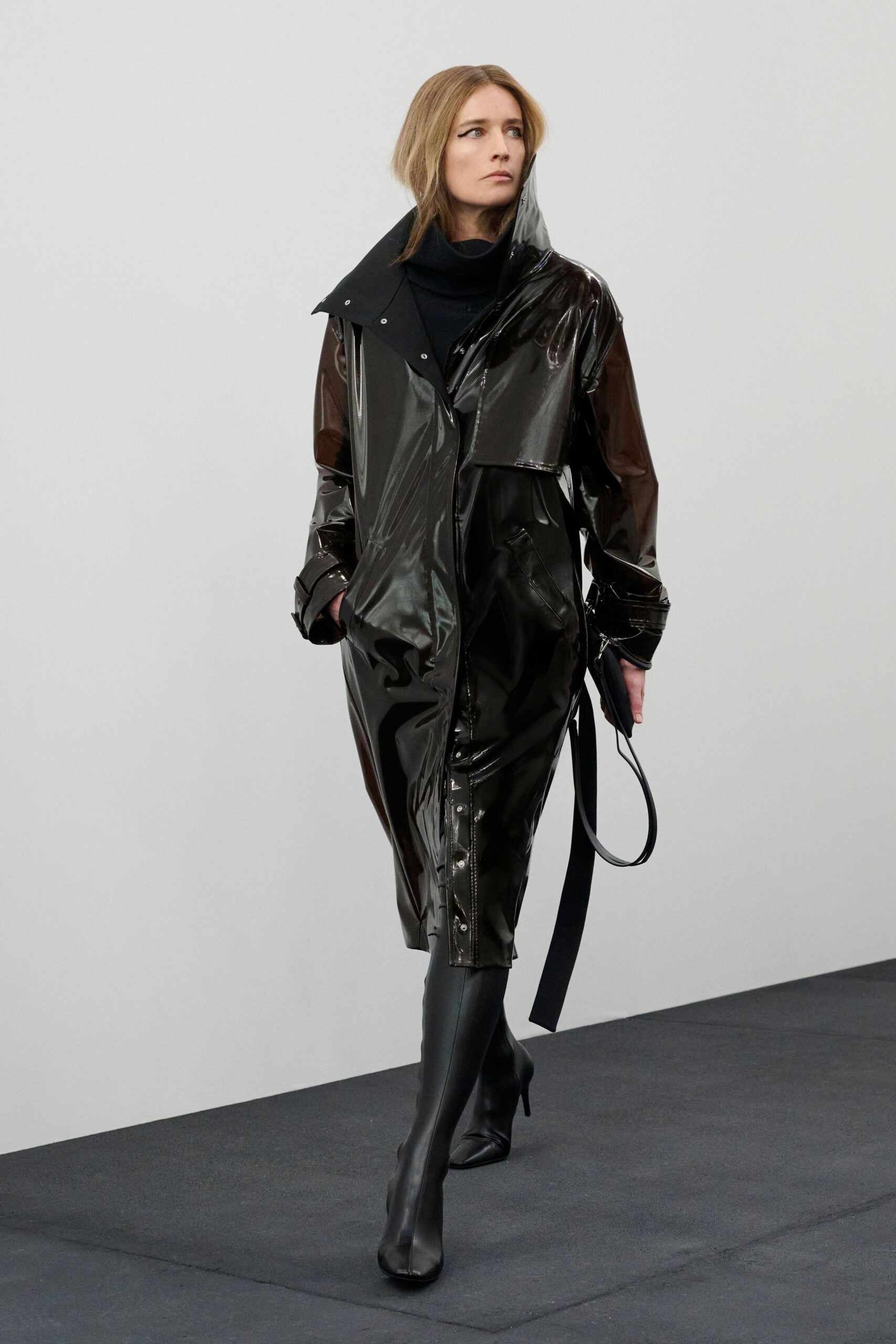 black vinyl long-sleeve collared relaxed zippered shiny coat