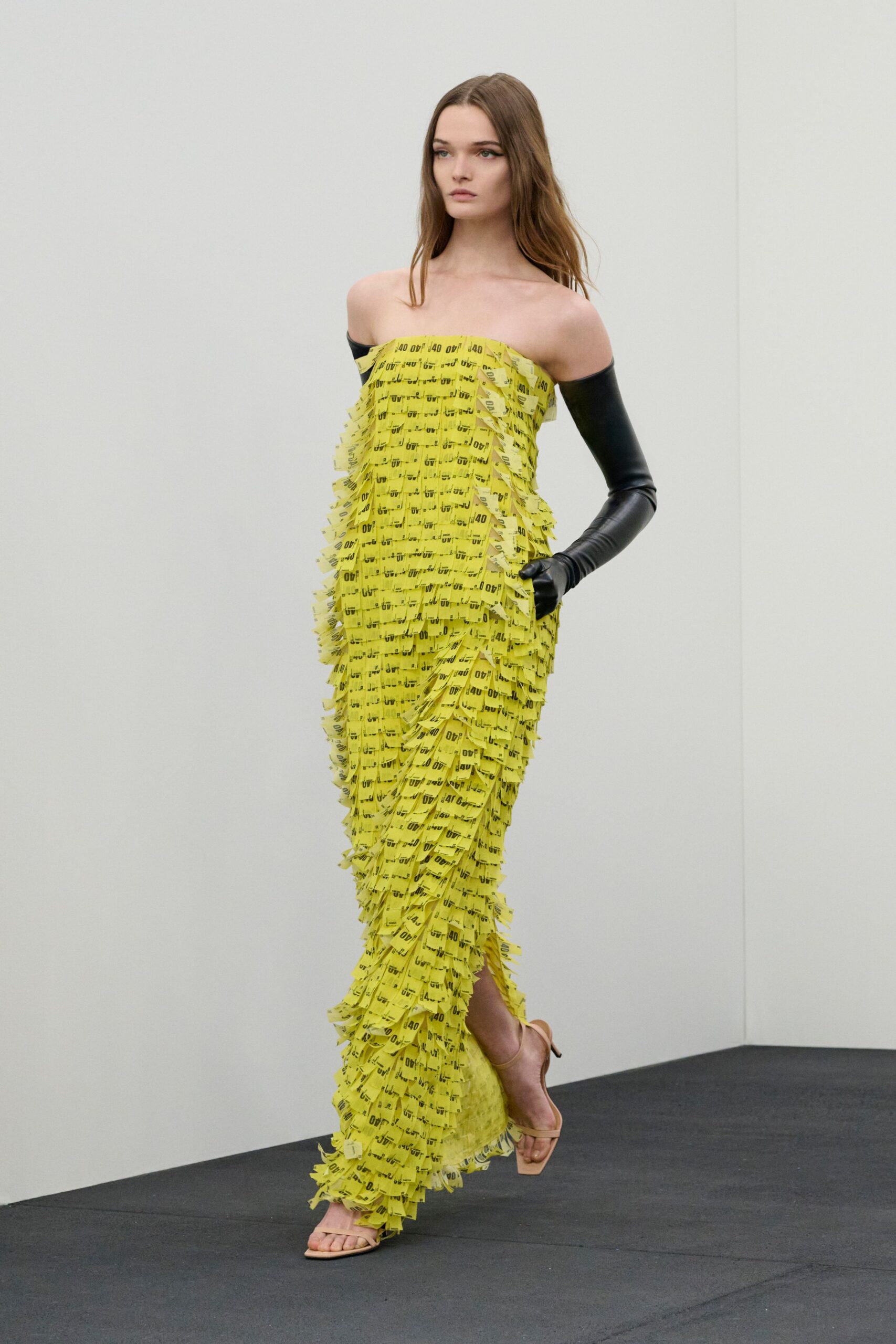 yellow silk strapless fitted ruffled maxi gown
