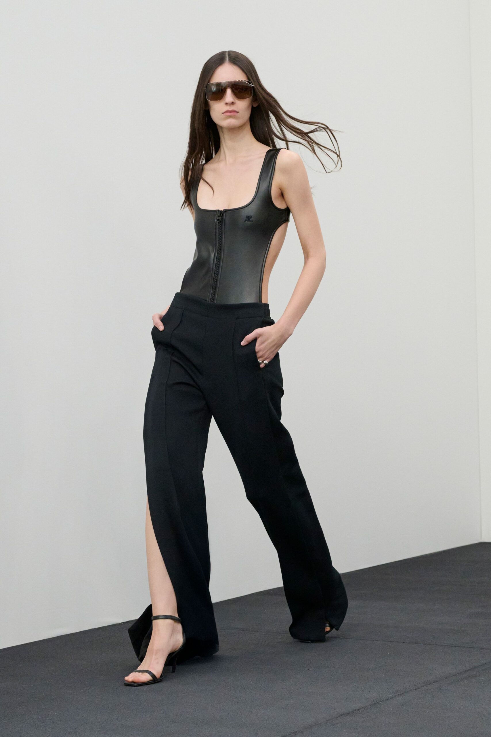 black leather sleeveless fitted zippered bodysuit
