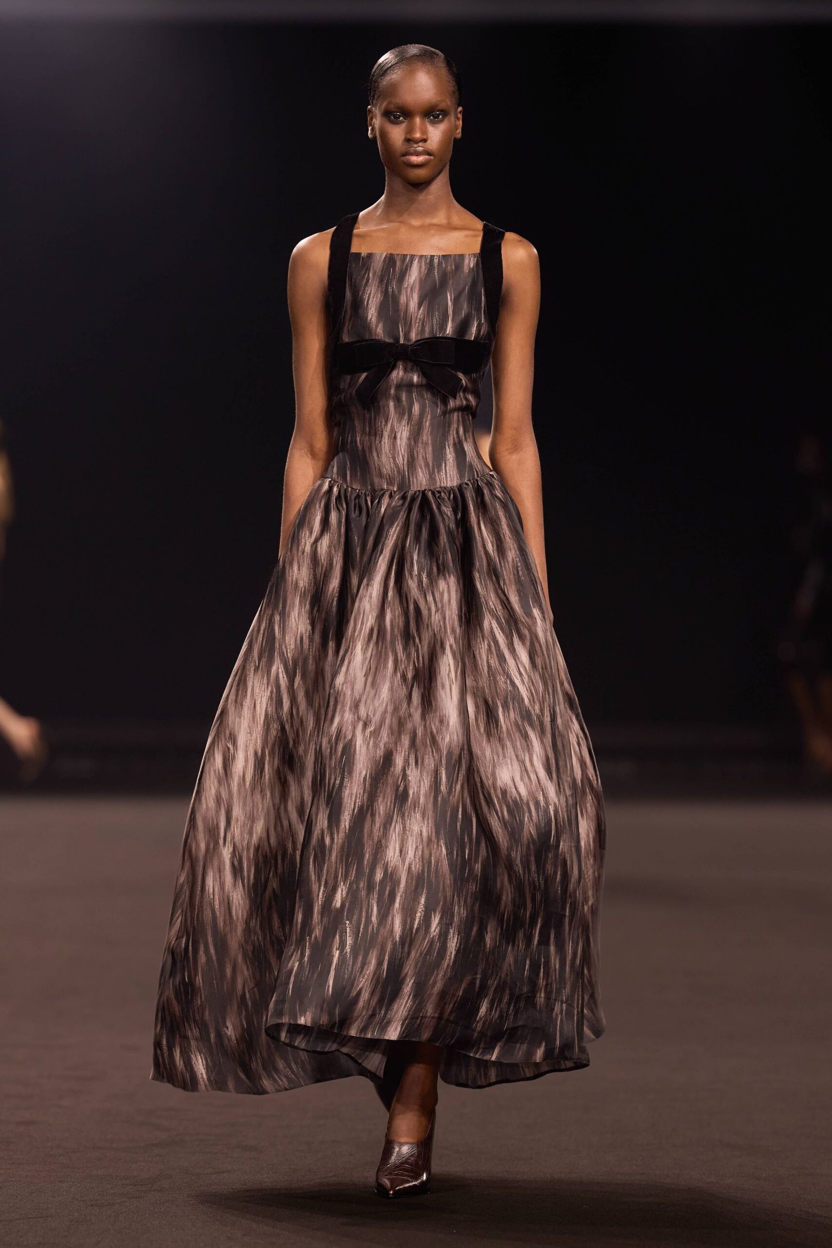 black and brown pleated gown