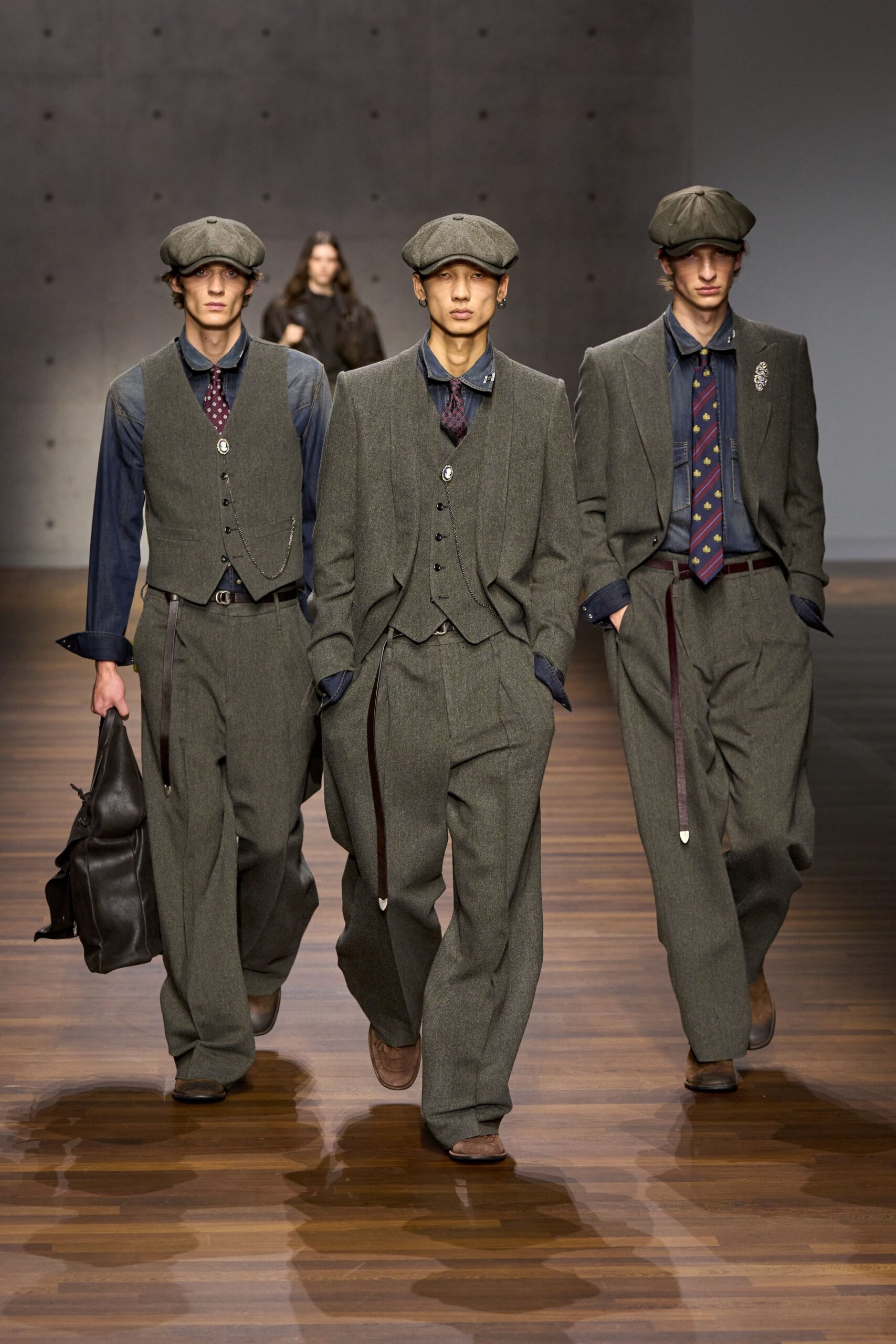 gray tailored suit with hat