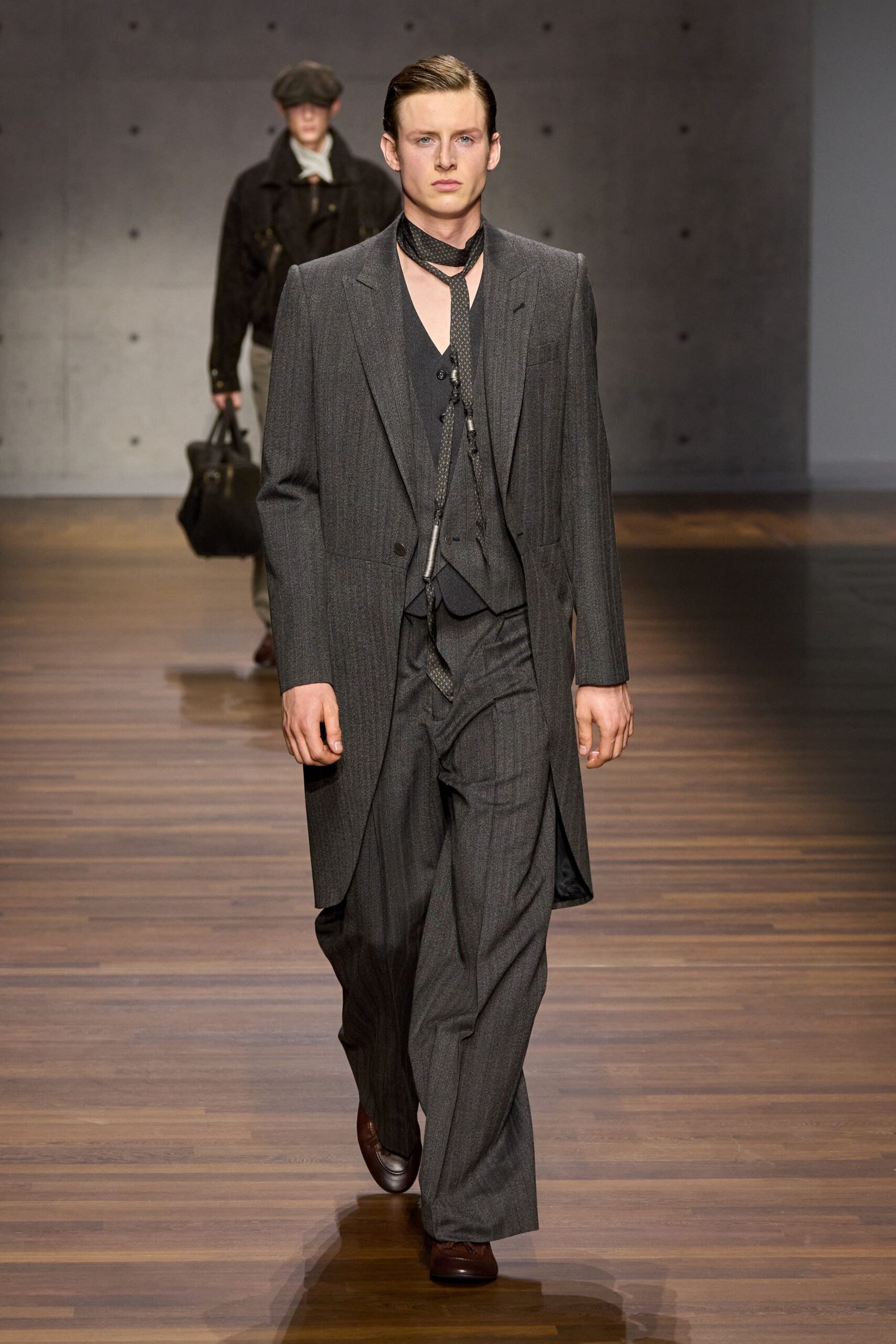 gray tailored suit with black shirt