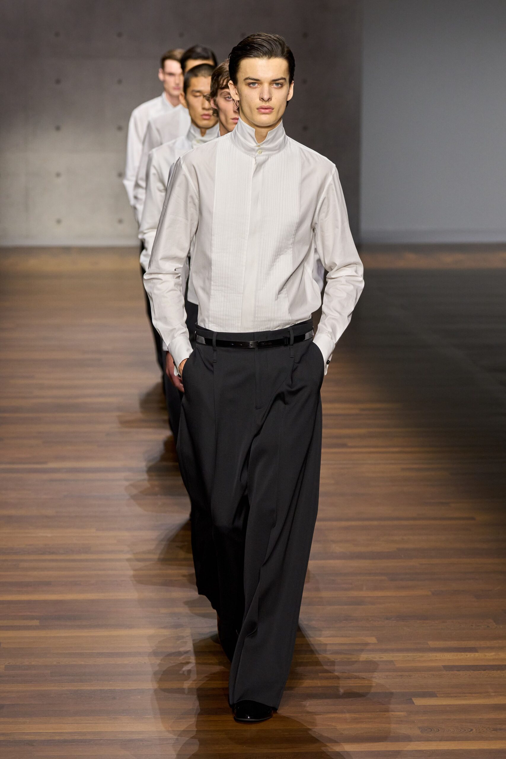 white fitted shirt and black pants
