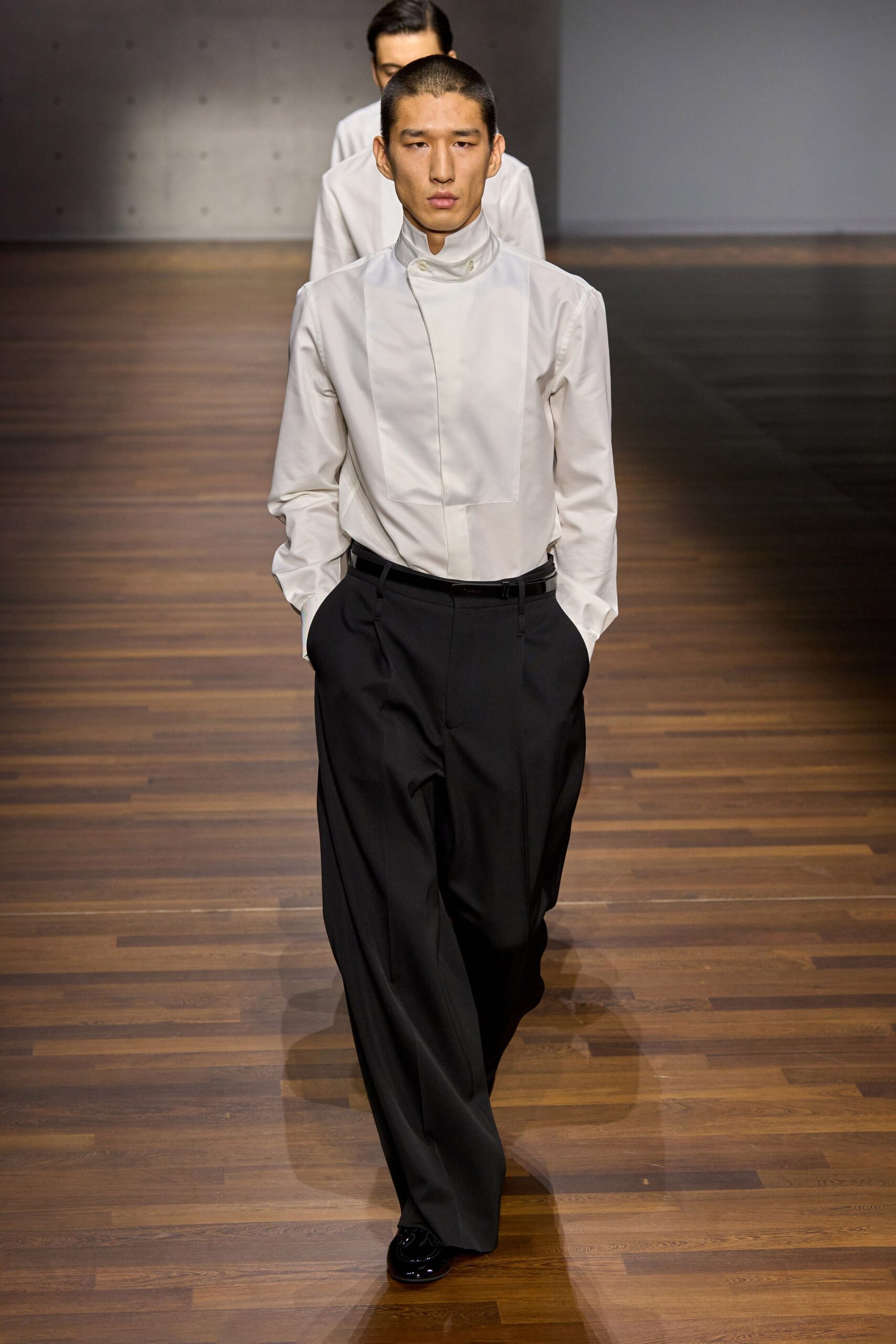 white fitted shirt black relaxed pants