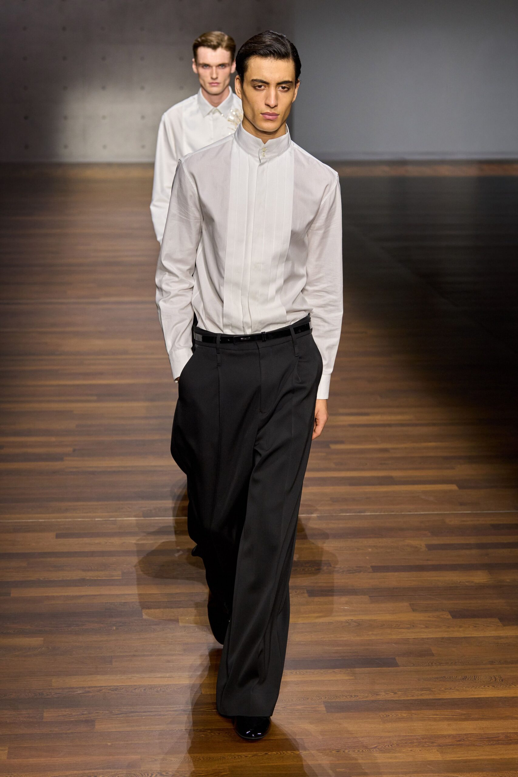 white fitted shirt and black wide-leg pants
