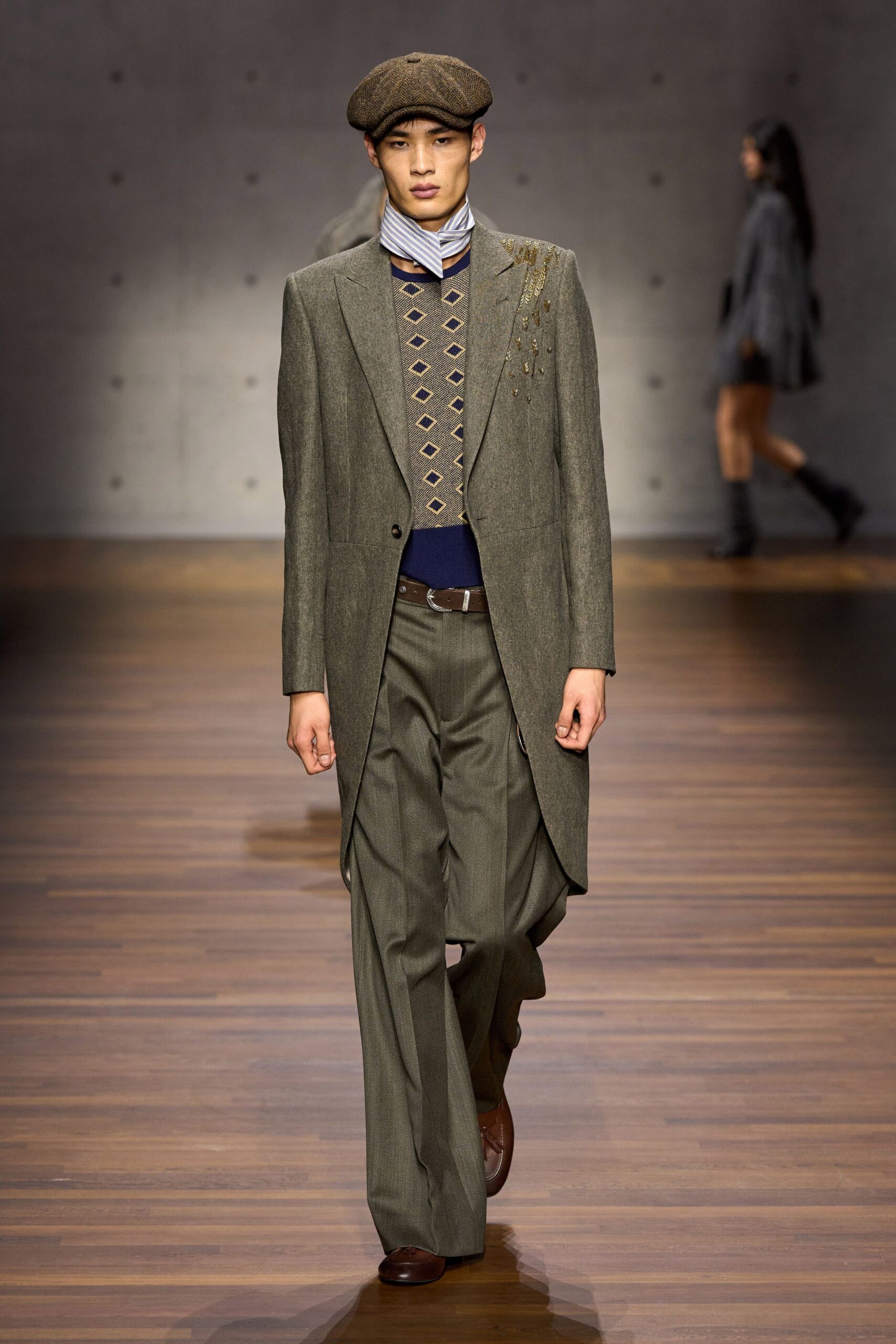gray tailored suit with blue shirt