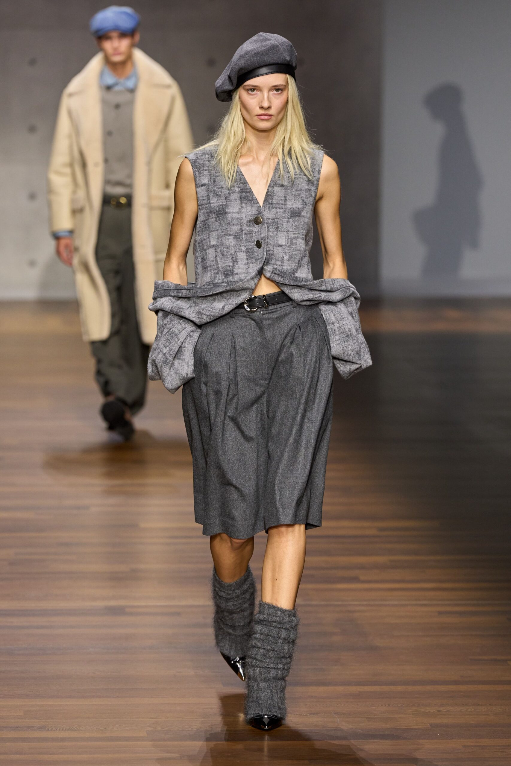 gray wool sleeveless collared fitted buttoned vest