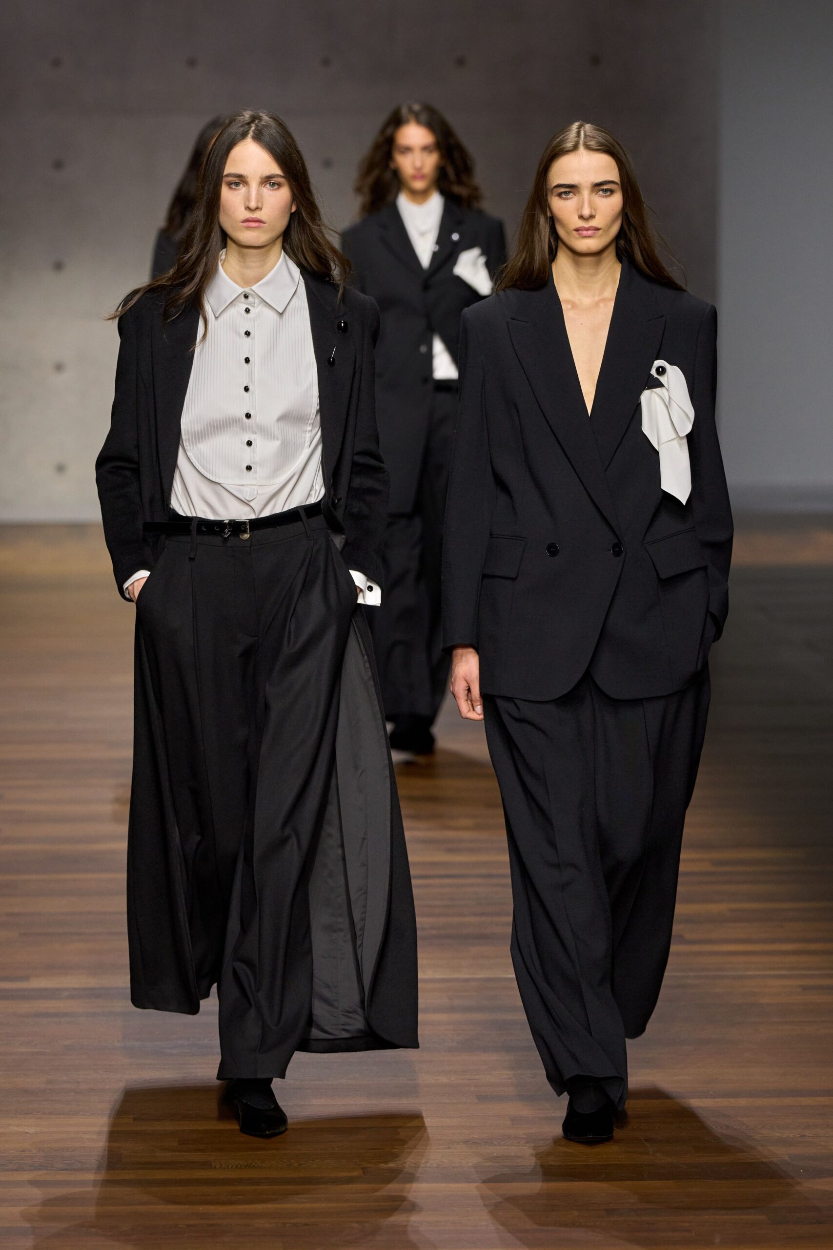 black tailored blazers with relaxed pants