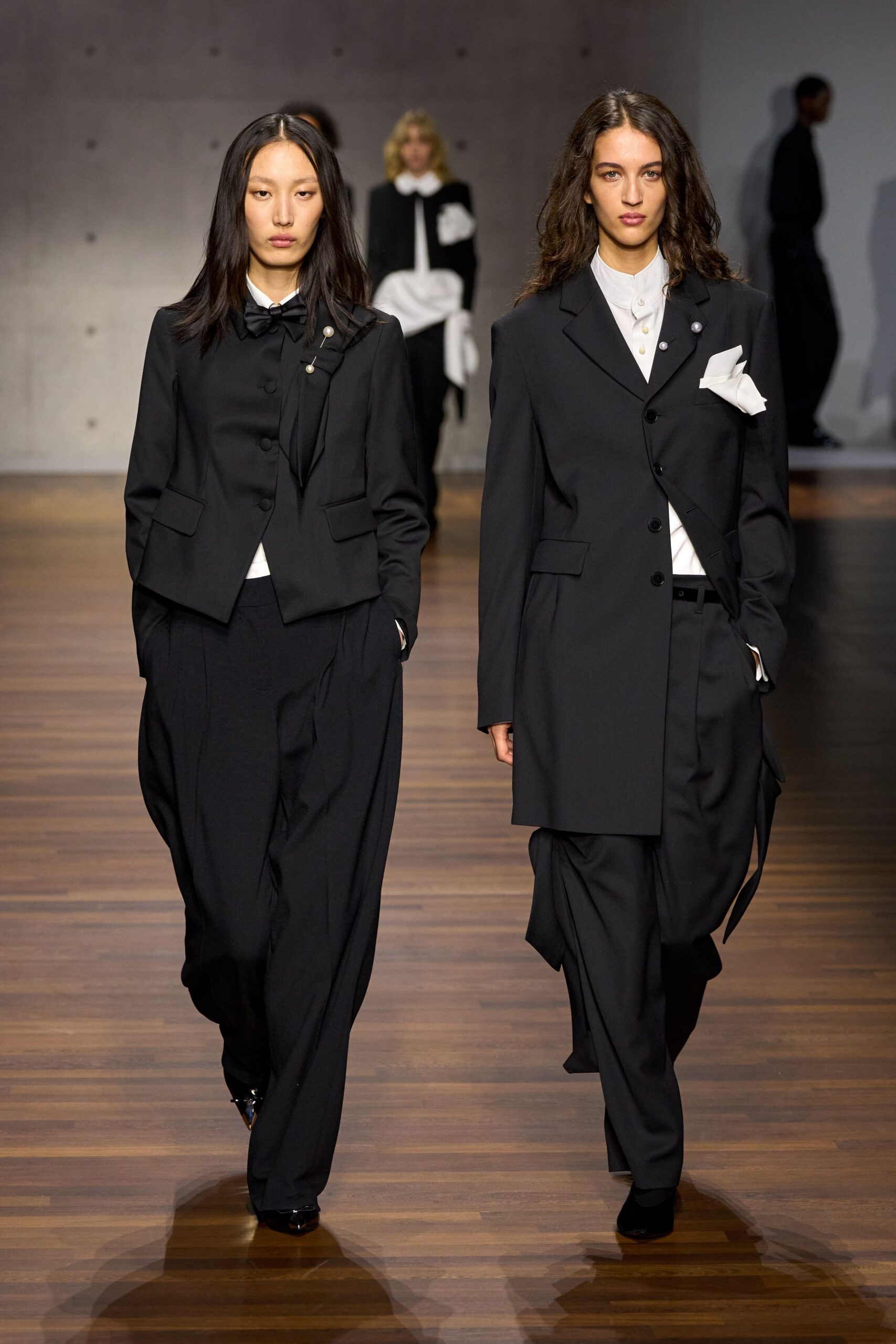 black tailored blazers and relaxed pants