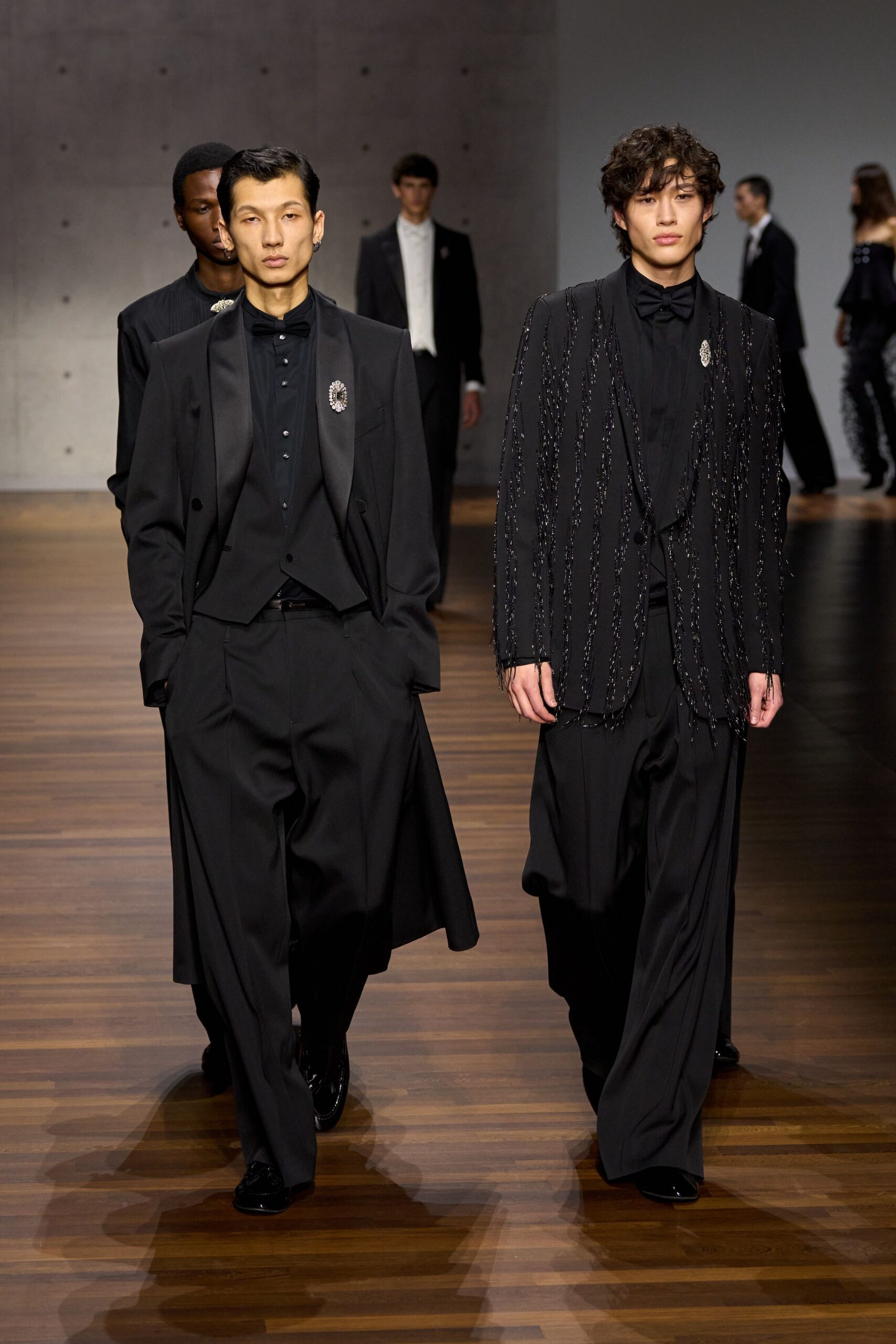 black tailored suit with wide-leg pants