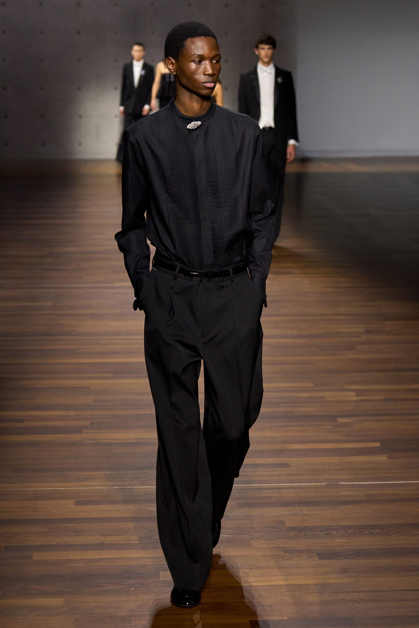 black fitted shirt and relaxed pants