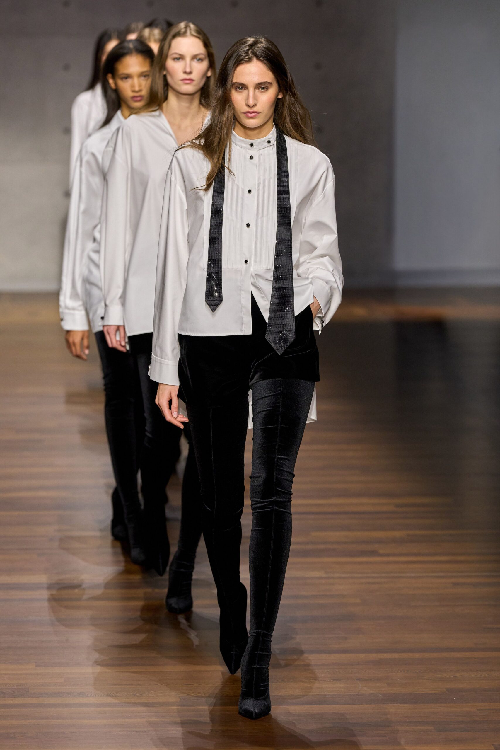 white fitted shirt with black pants