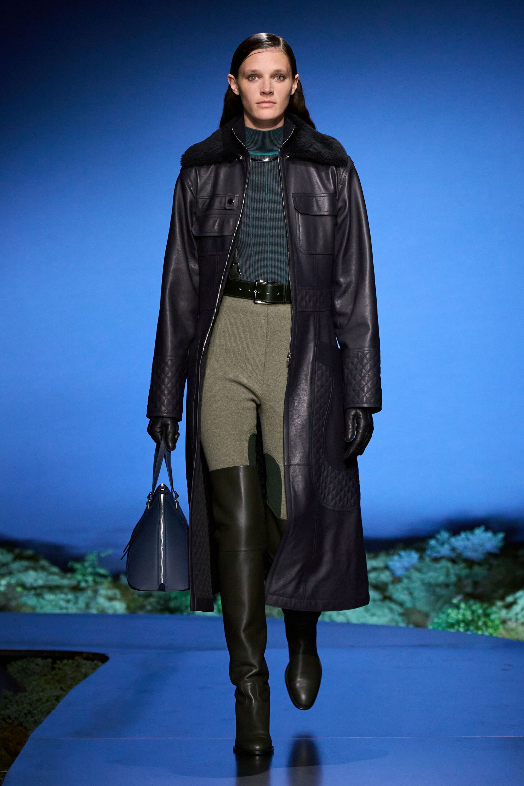 black leather coat with green top