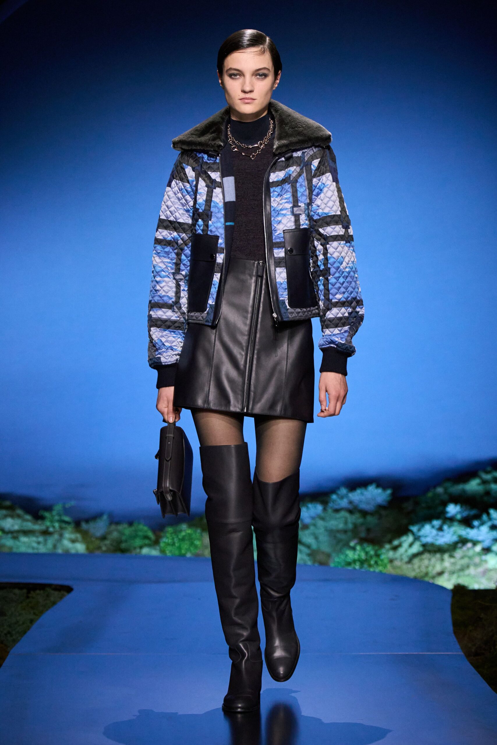 blue quilted jacket black mini skirt