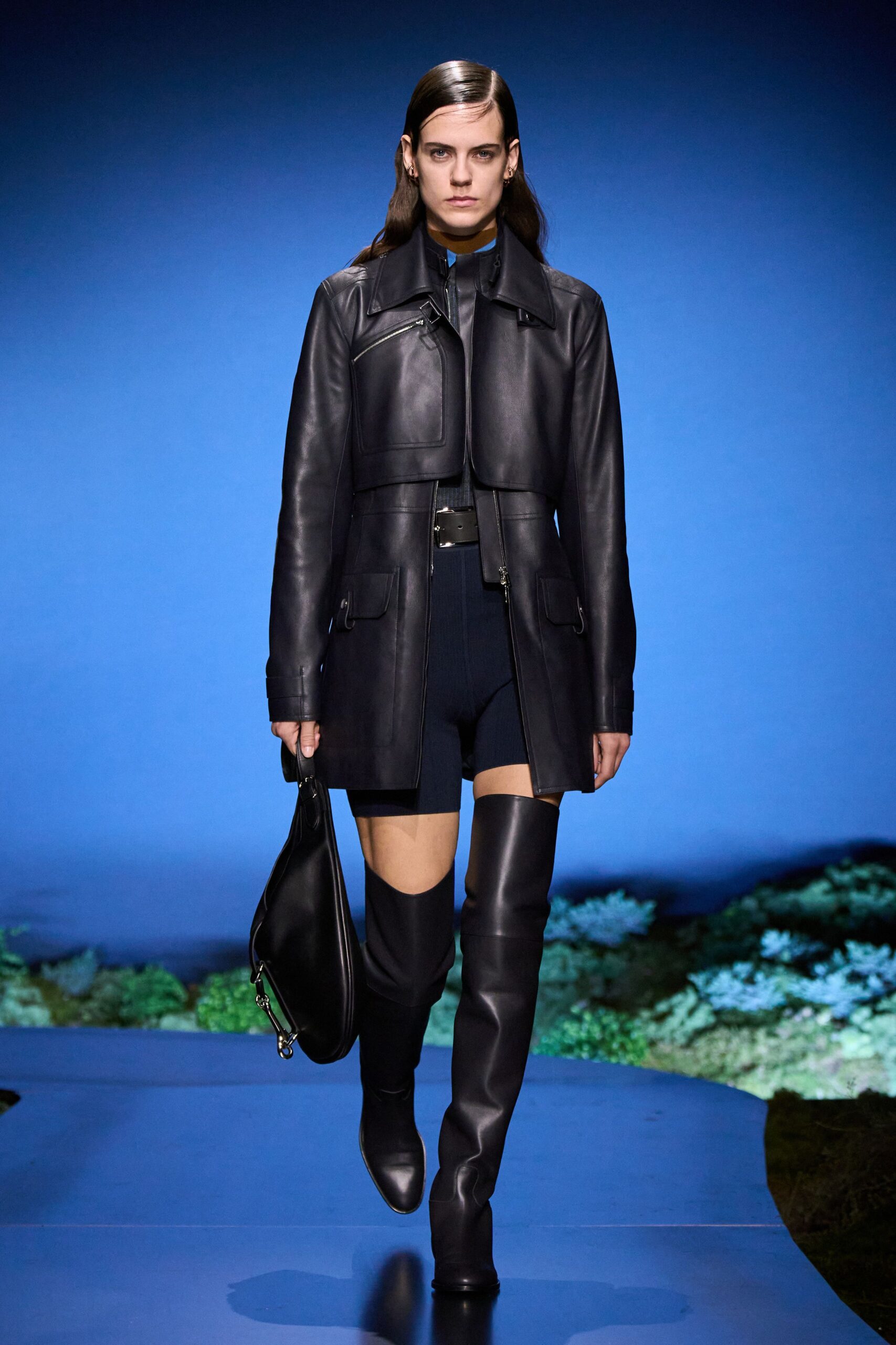 black leather long-sleeve collared fitted zippered belted coat