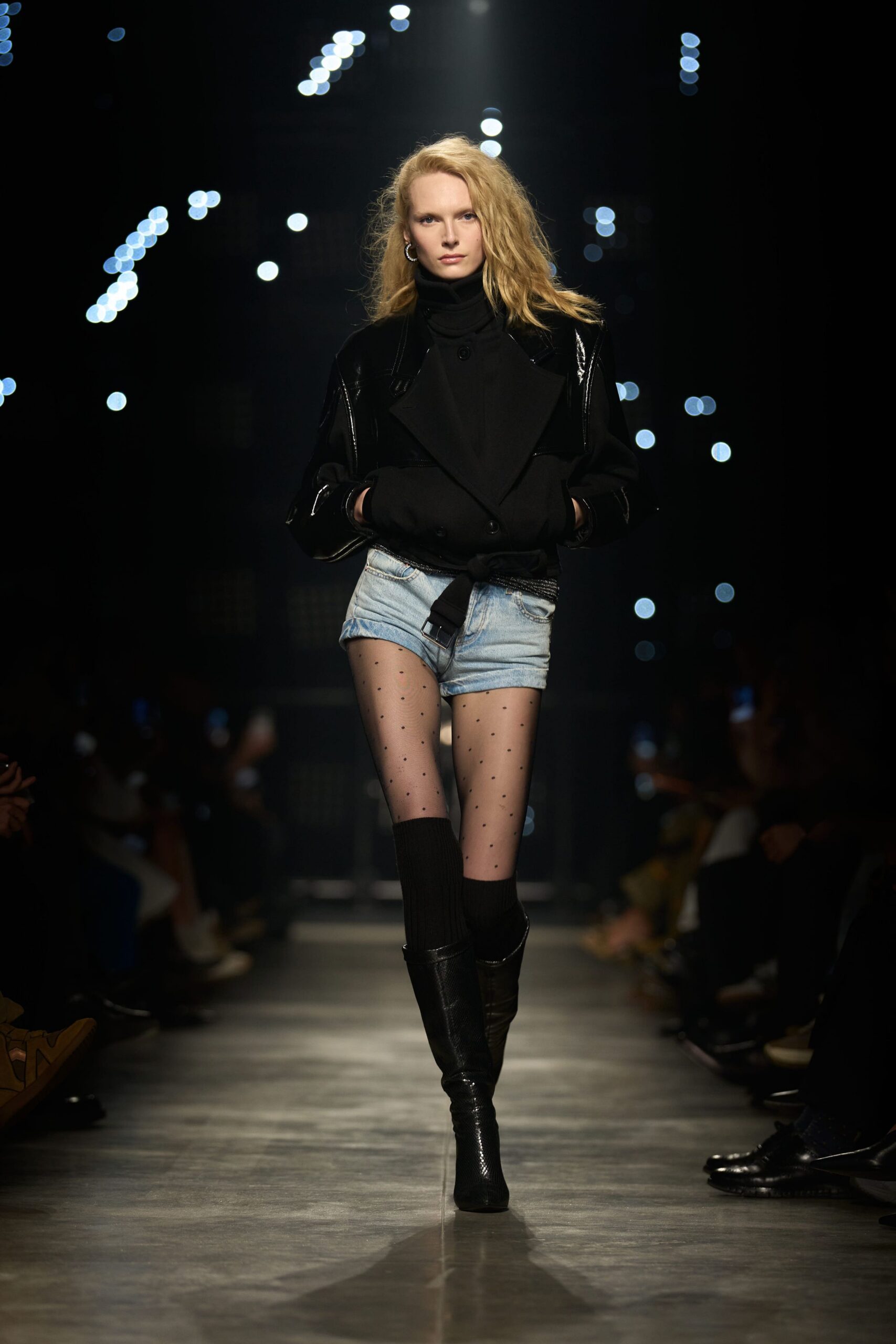 black leather jacket with denim shorts