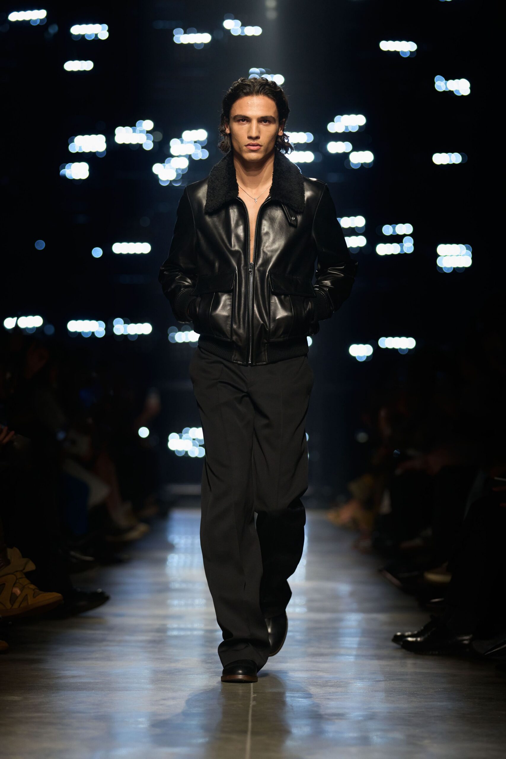 black leather jacket and tailored pants