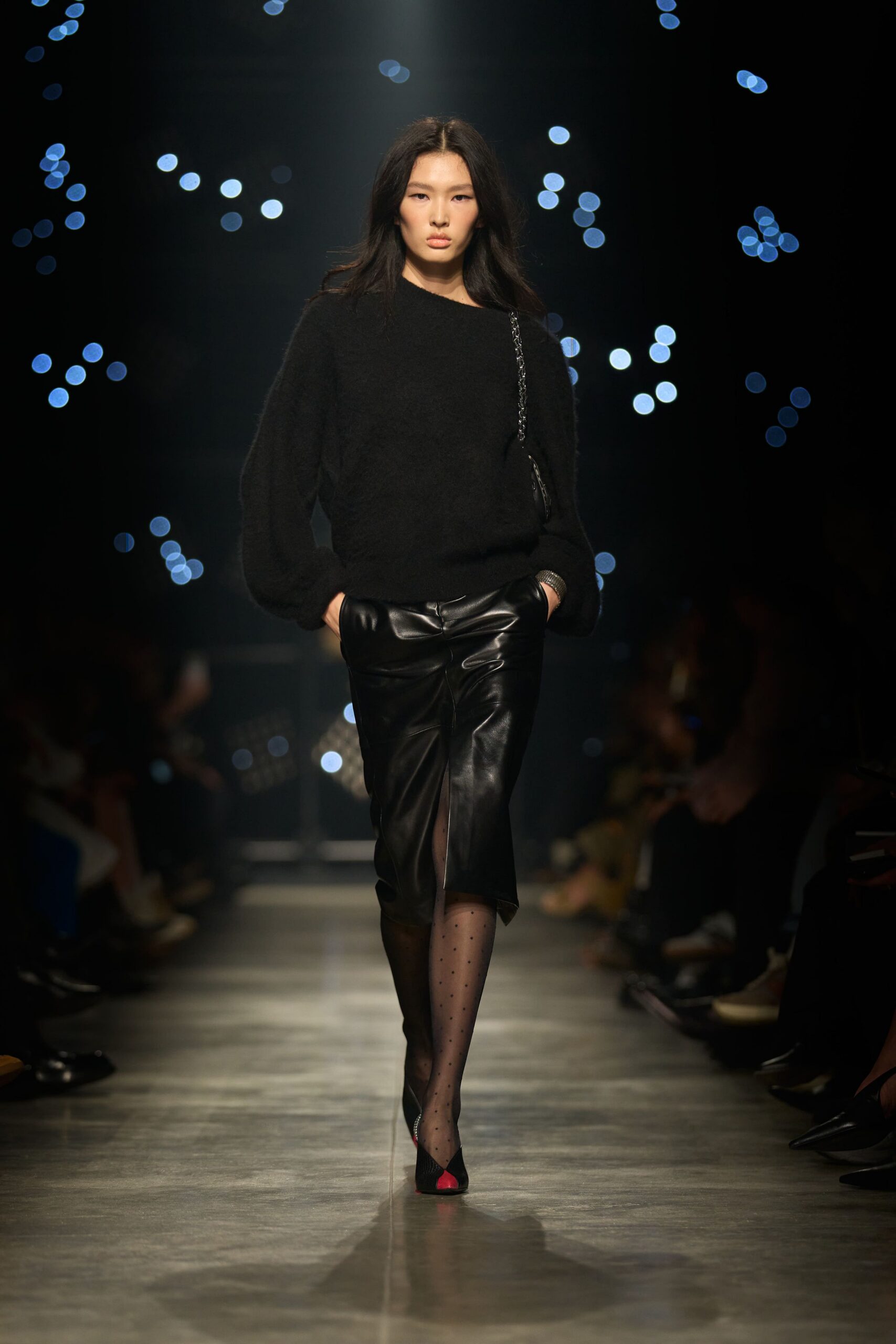 black wool sweater and leather skirt