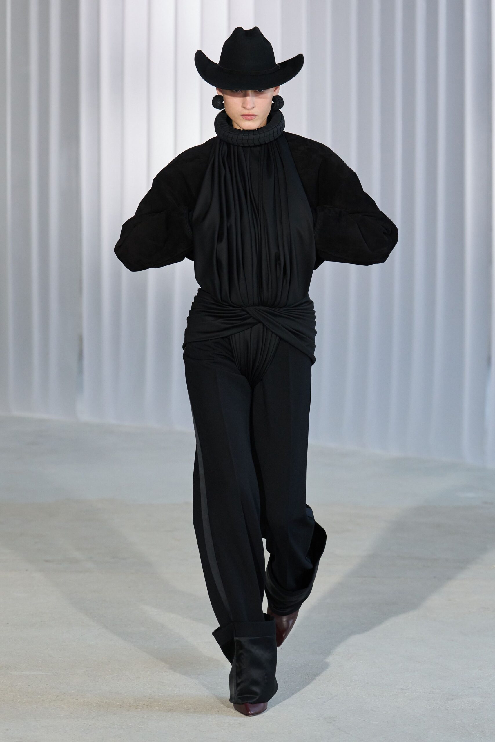black fitted jumpsuit with hat