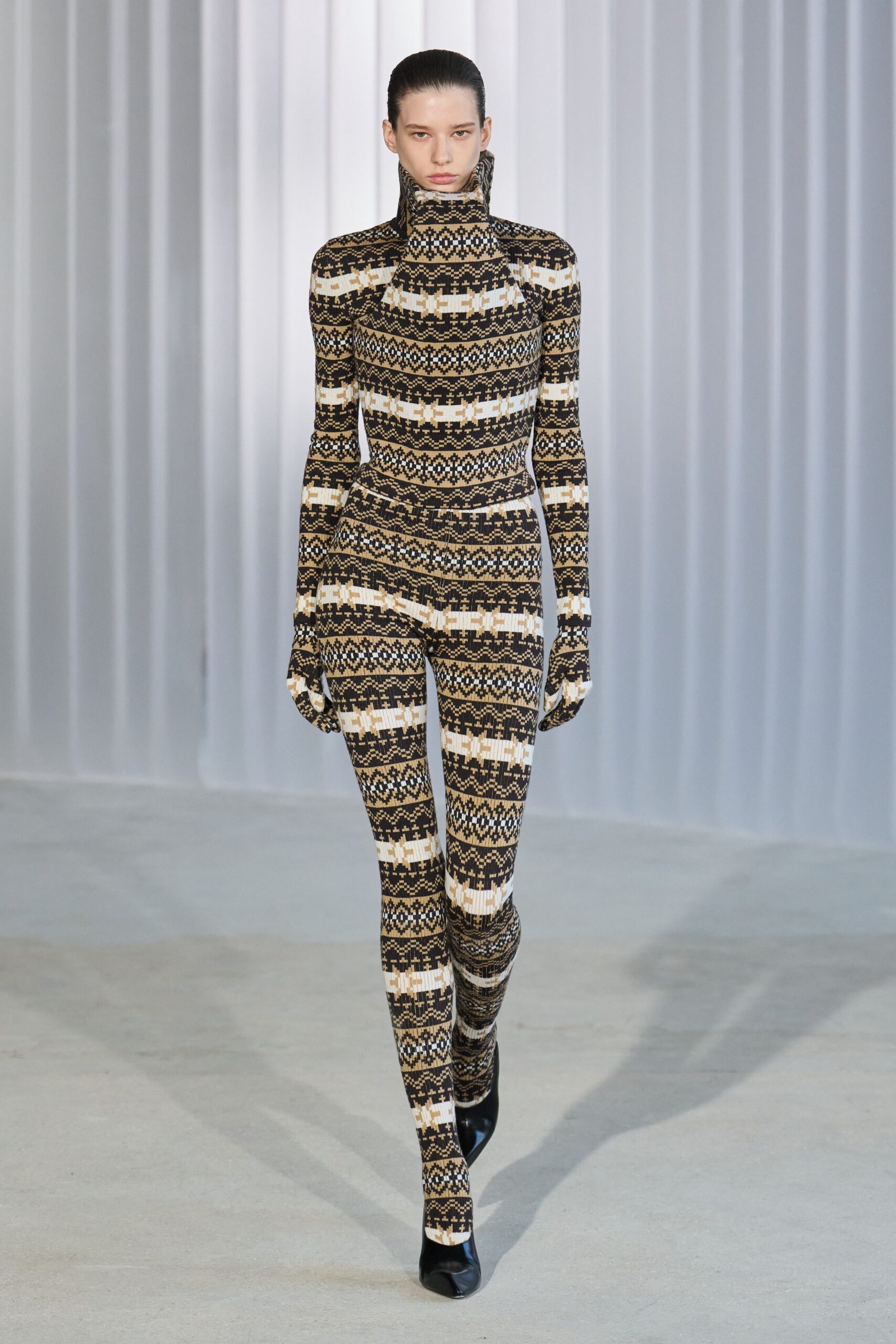 black and beige printed catsuit