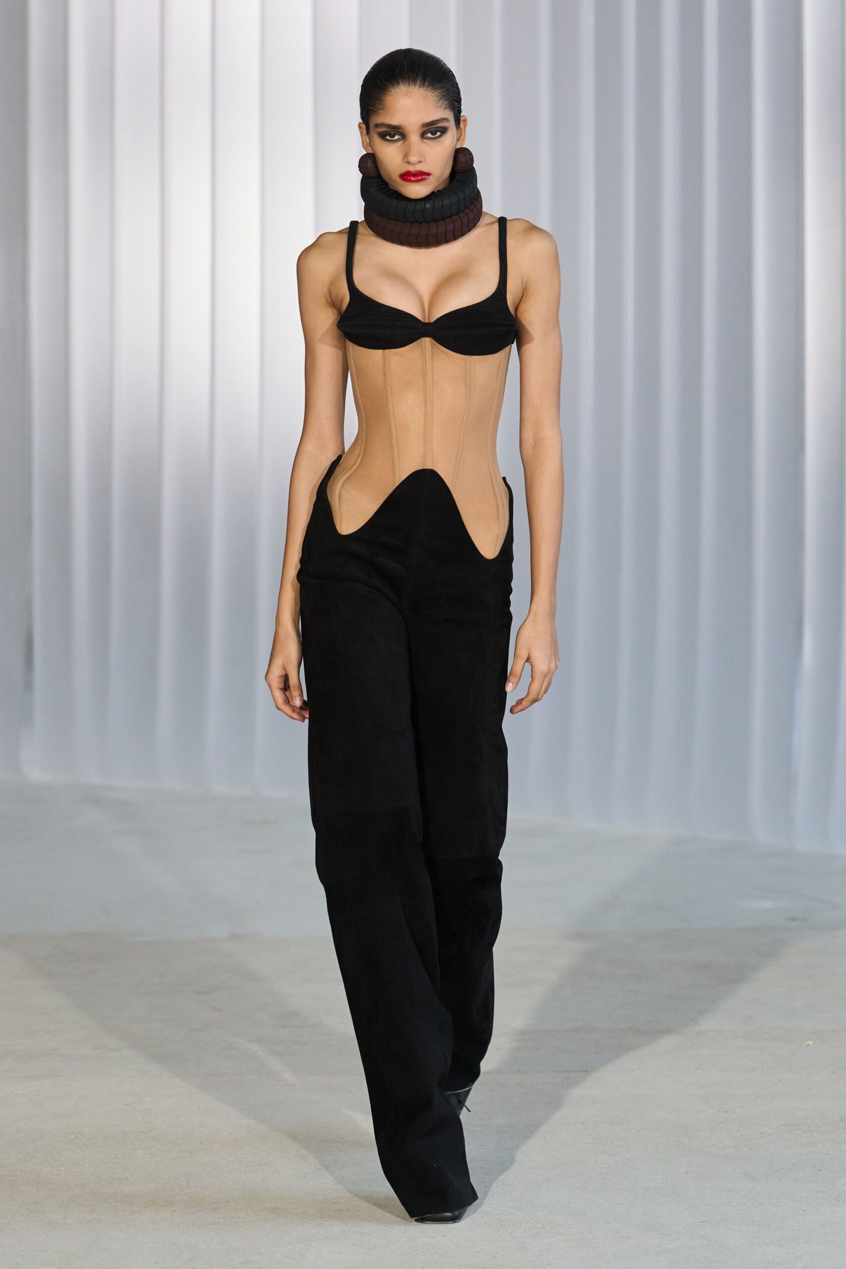 black leather bodysuit and pants