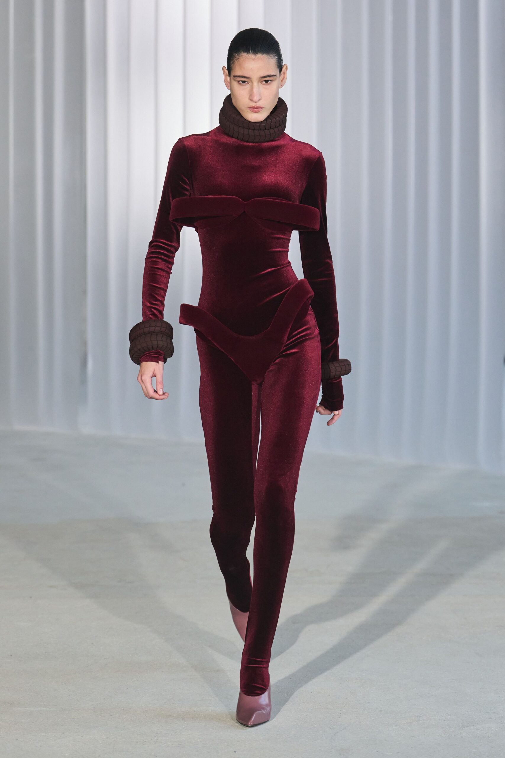 red velvet fitted catsuit