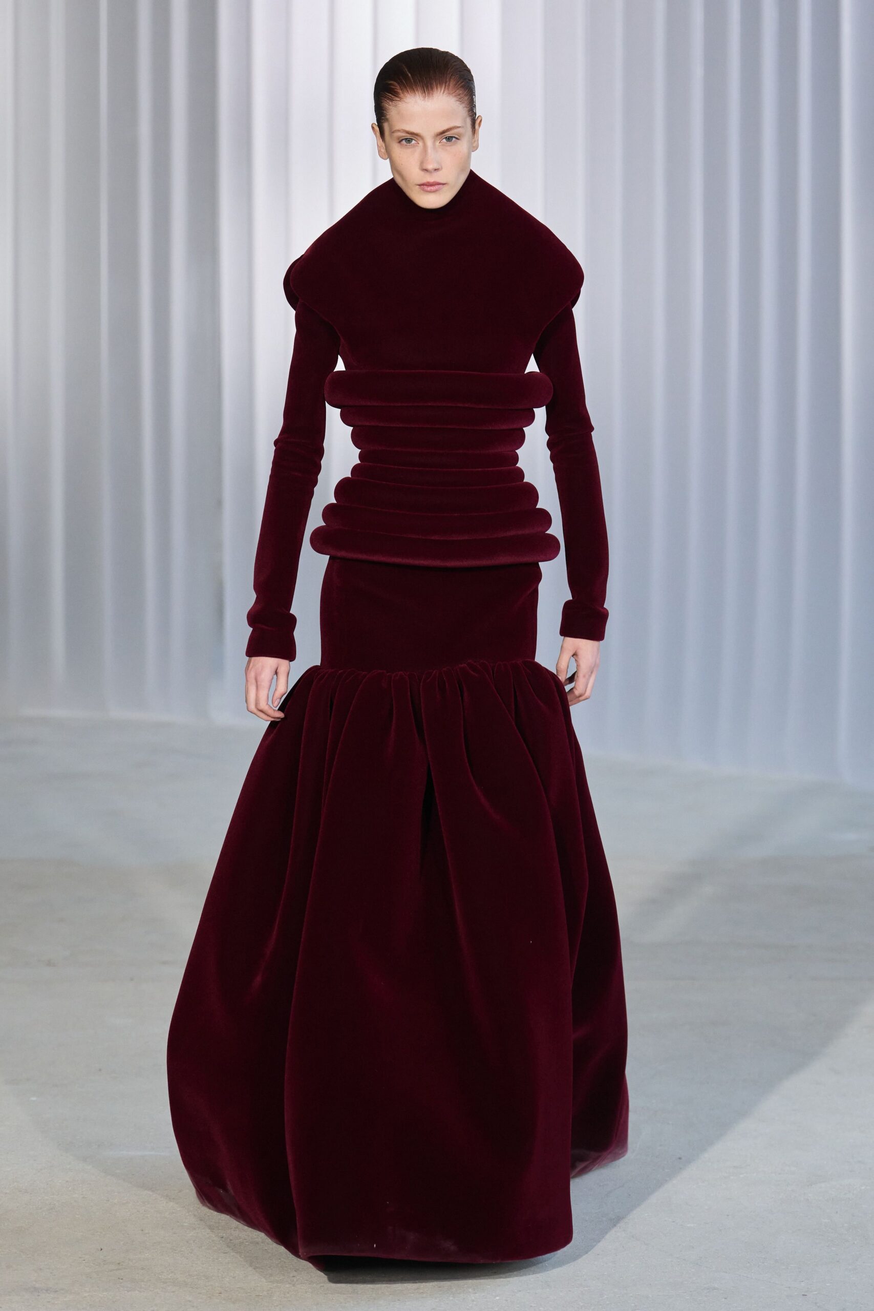 red velvet long-sleeve gown