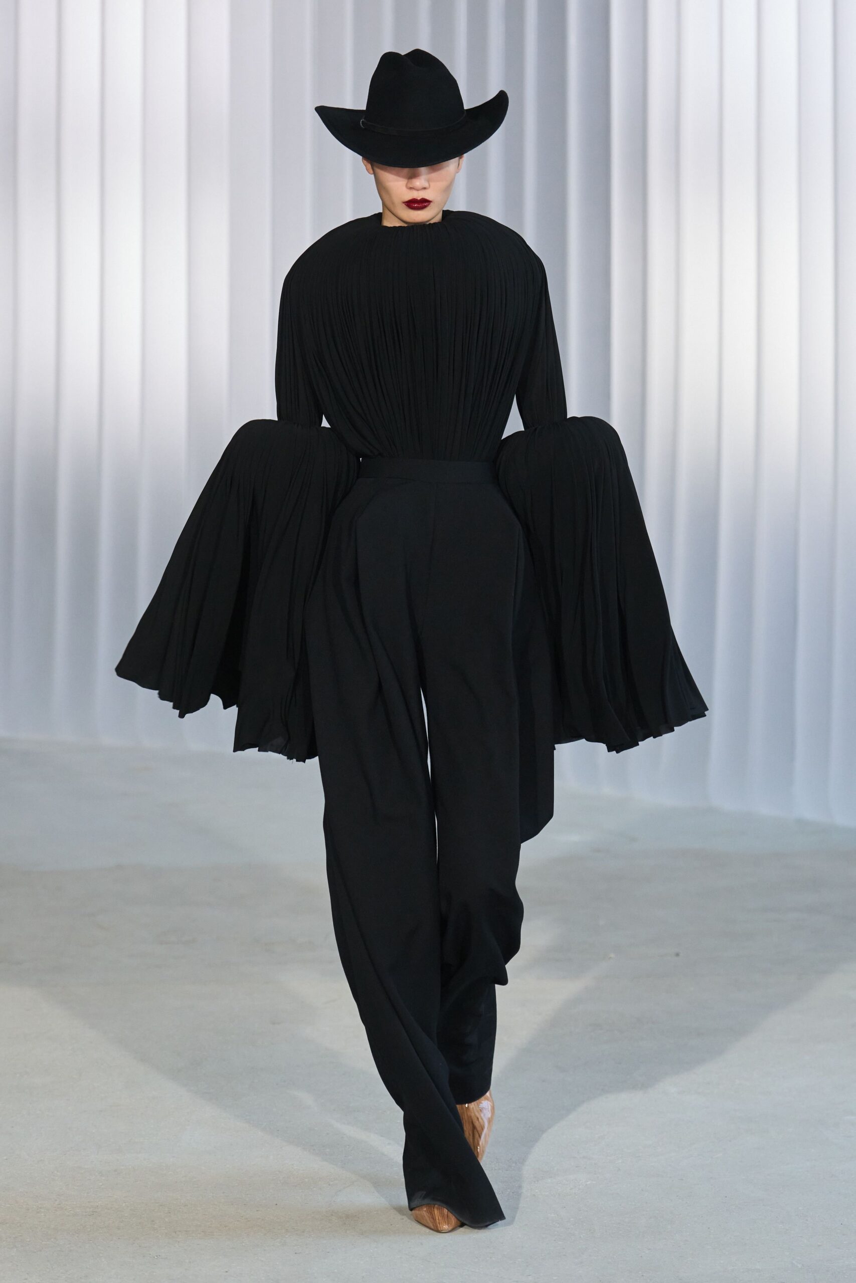 black pleated top and pants
