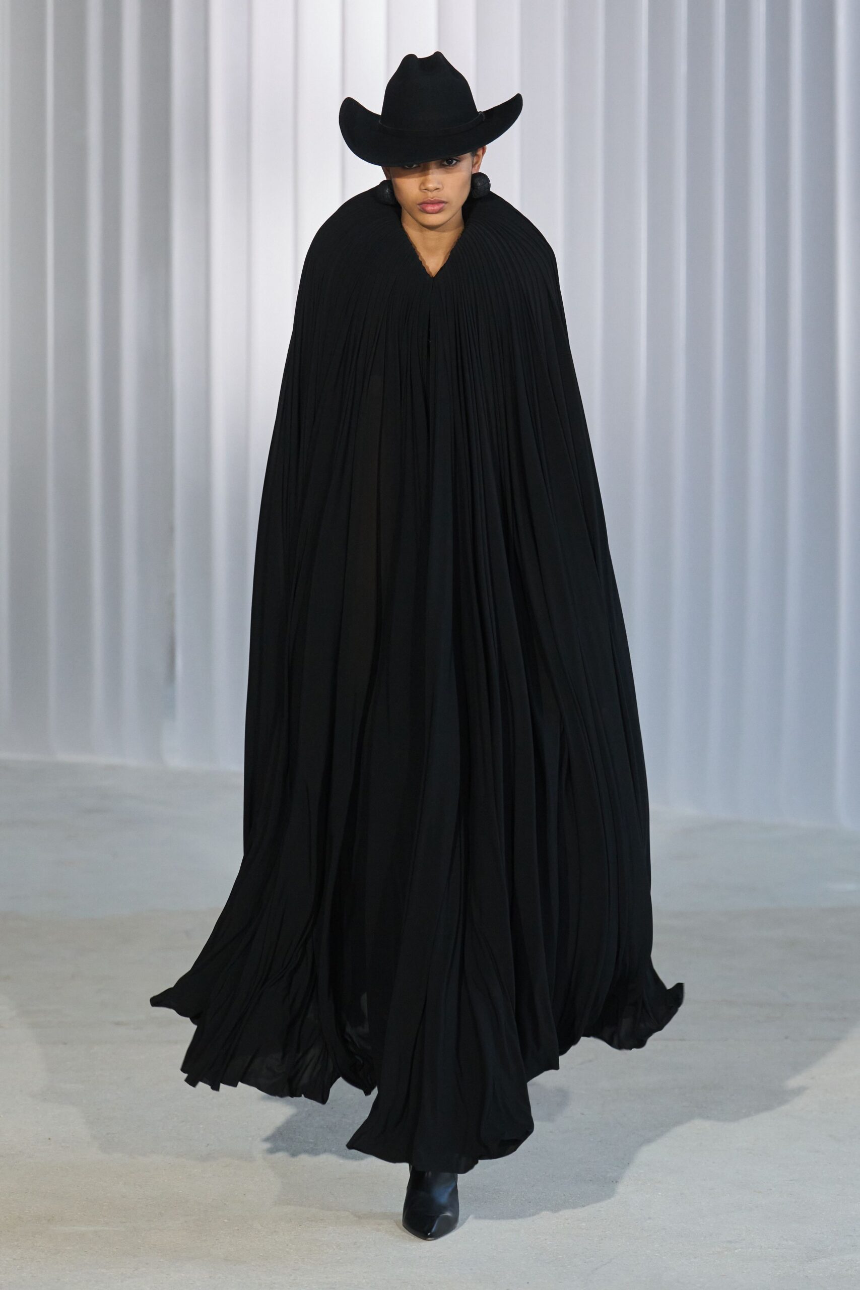 black pleated cape with hat