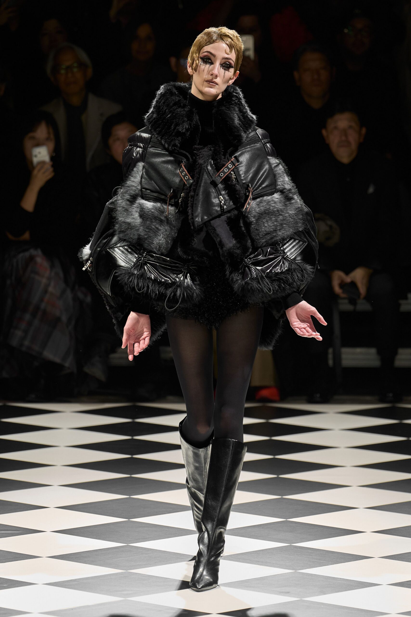black leather fitted shiny boots