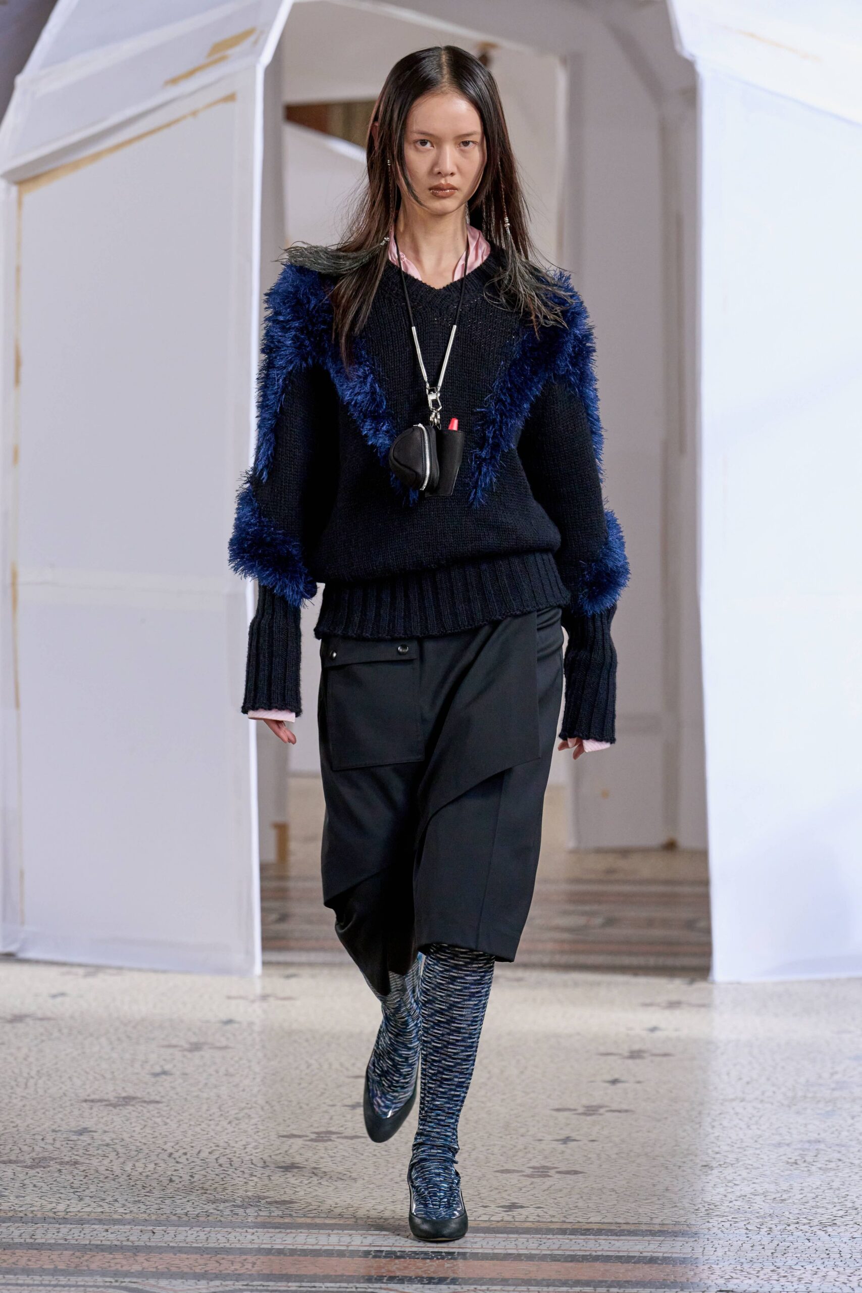 black wool relaxed sweater with fringes
