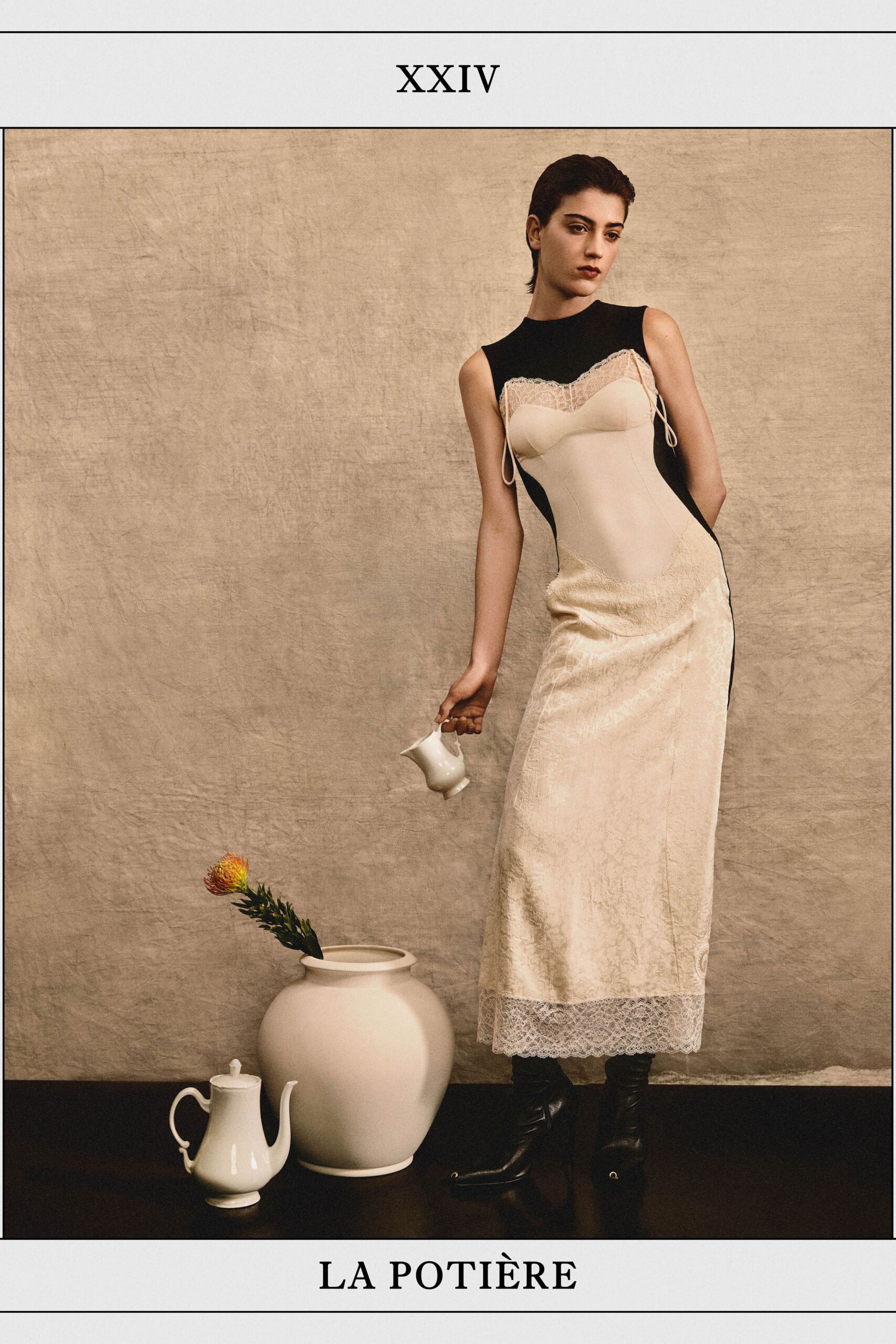 black silk sleeveless high-neck fitted layered ruched dress