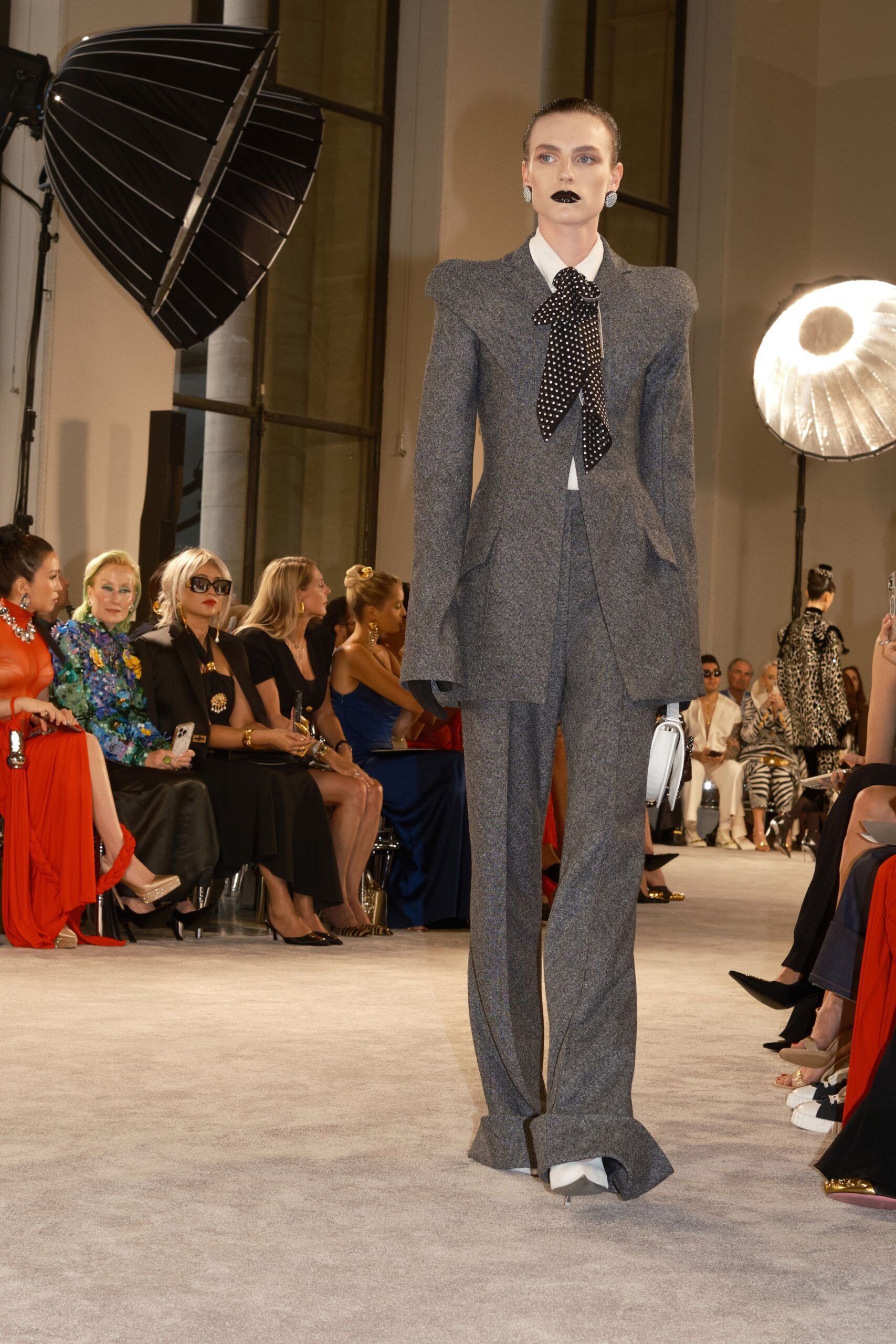 gray tailored suit with white blouse